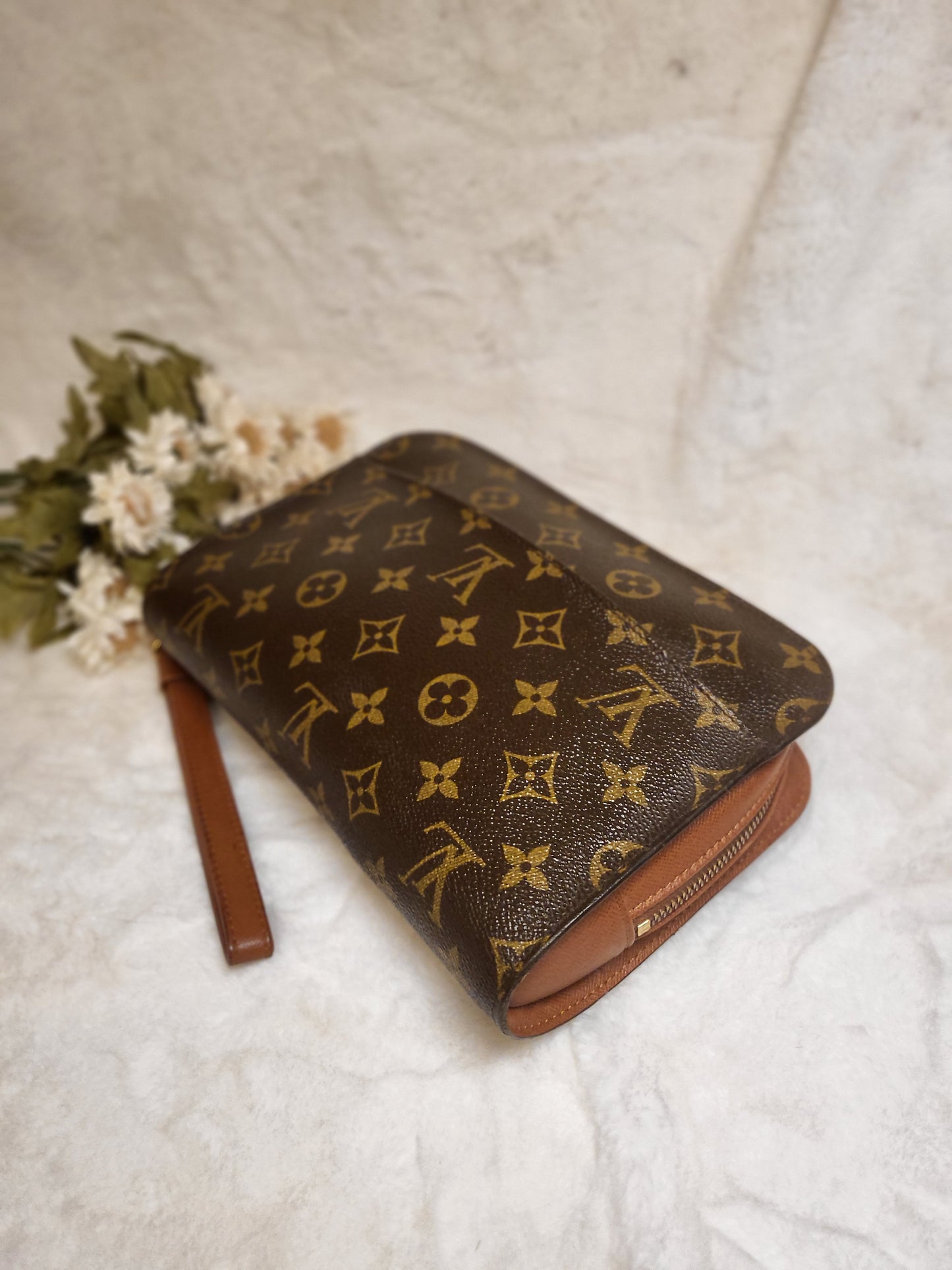 Authentic pre-owned Louis Vuitton Orsay monogram clutch