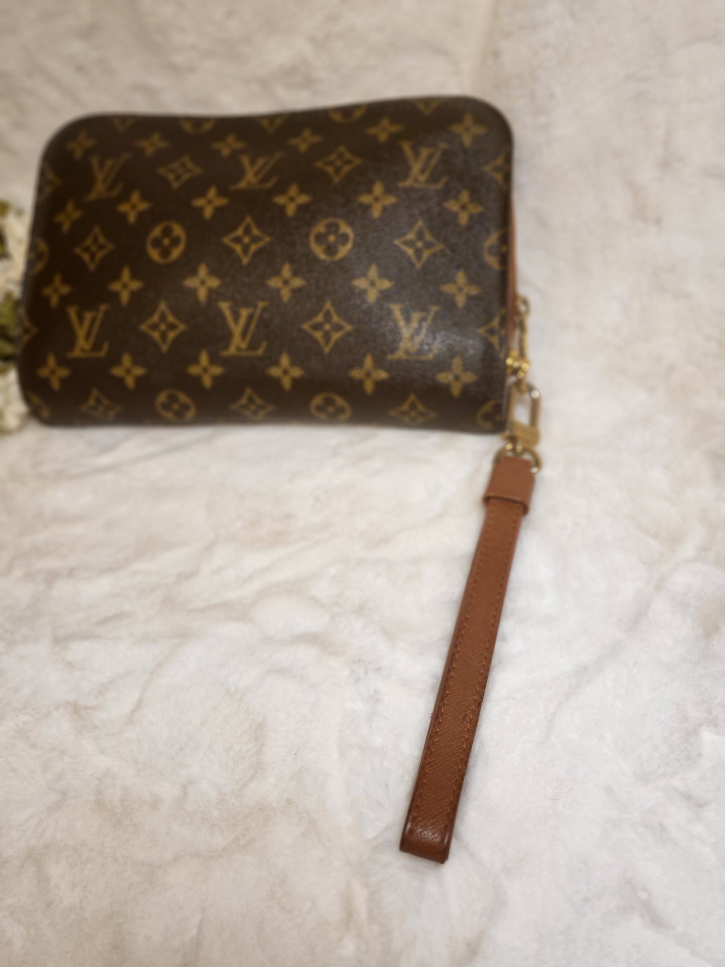 Authentic pre-owned Louis Vuitton Orsay monogram clutch