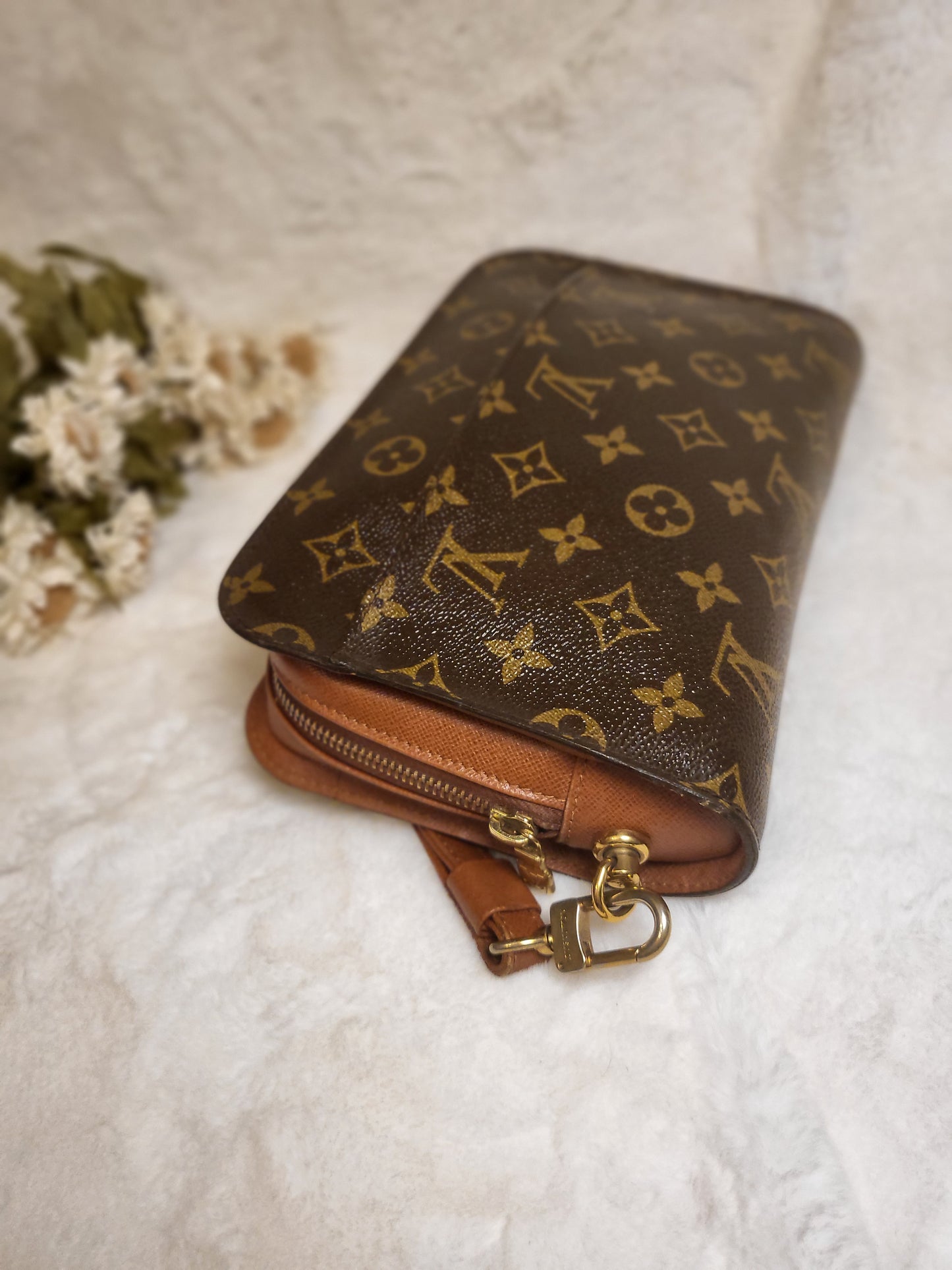 Authentic pre-owned Louis Vuitton Orsay monogram clutch