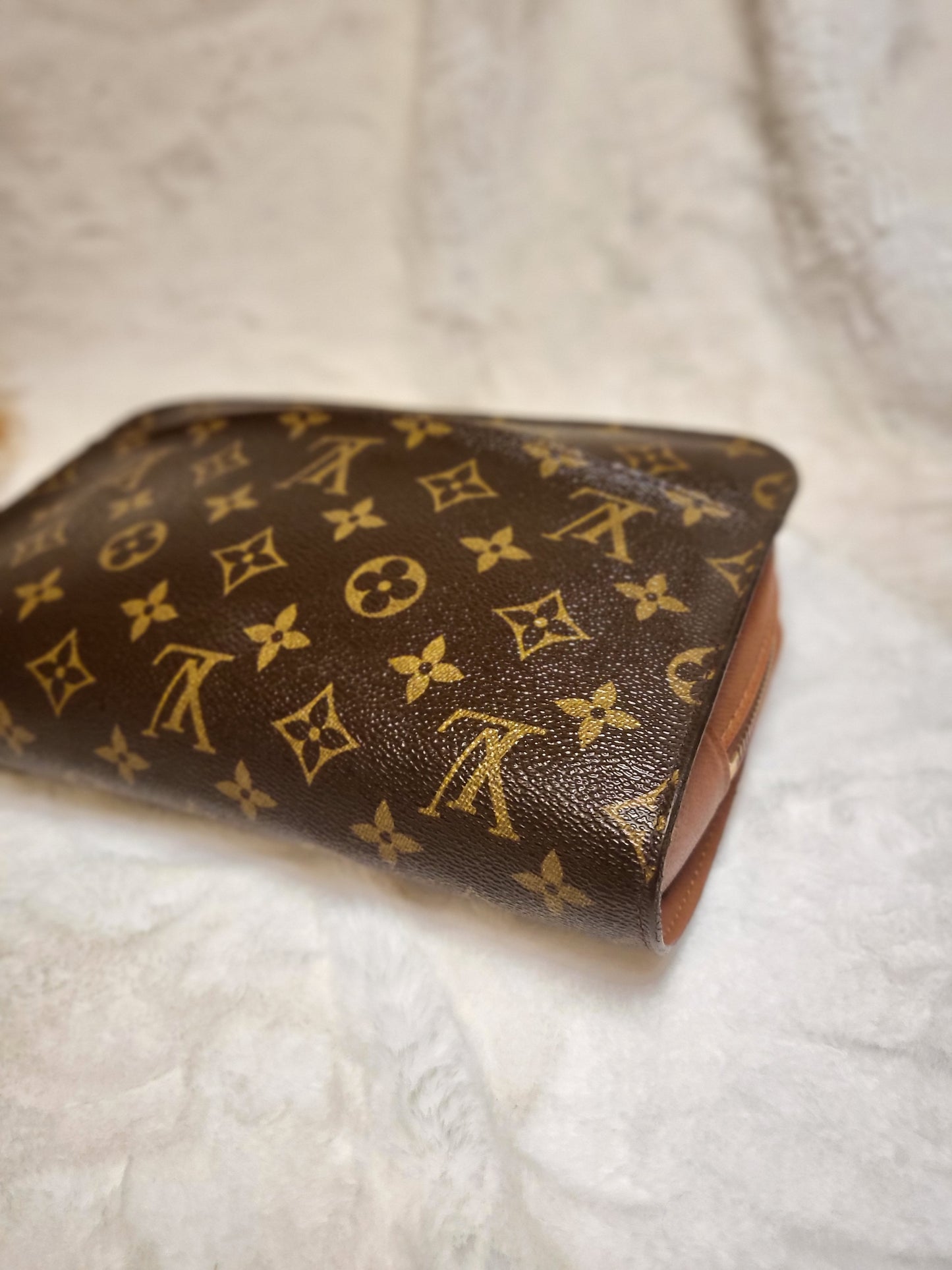 Authentic pre-owned Louis Vuitton Orsay monogram clutch