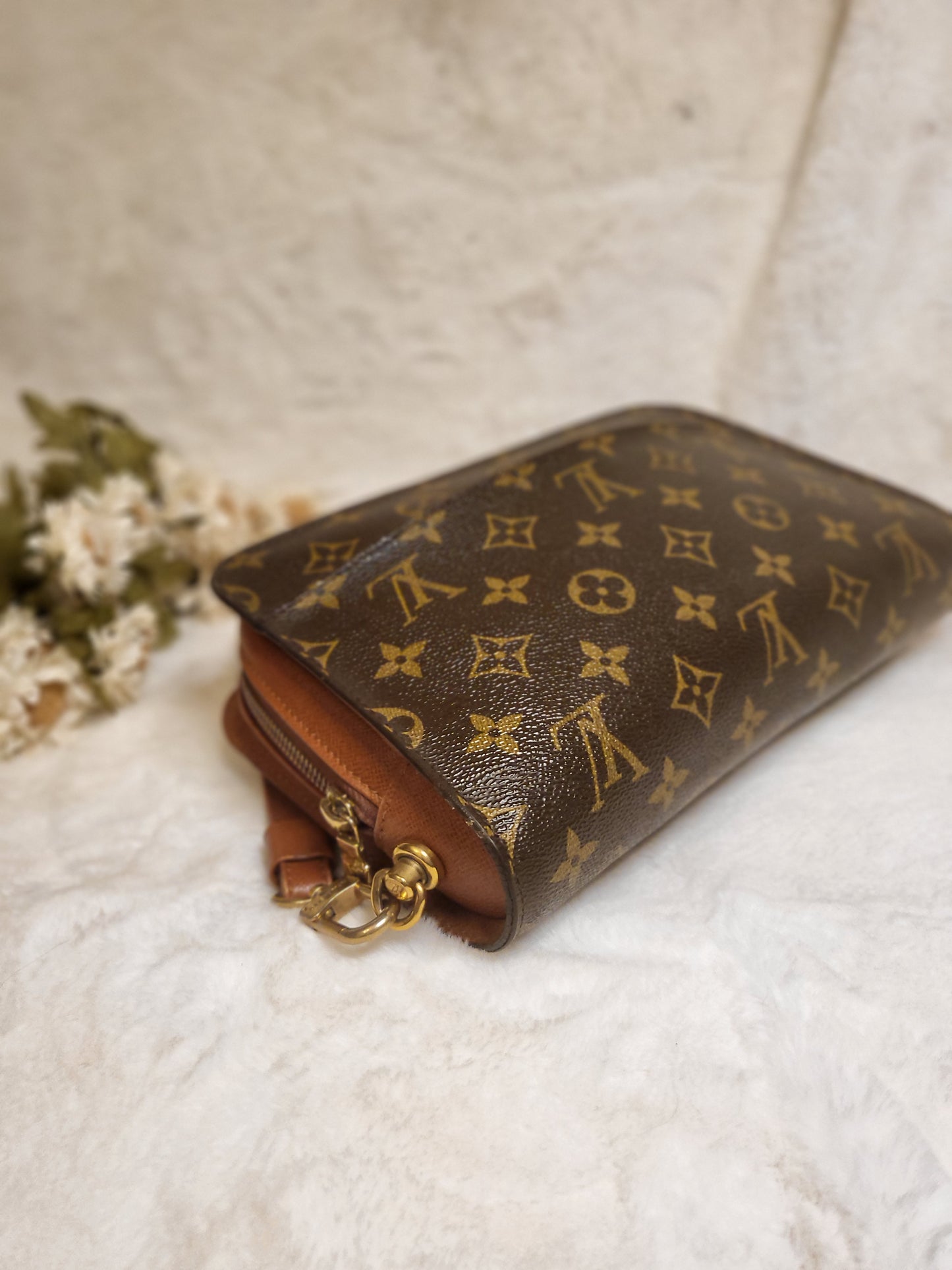 Authentic pre-owned Louis Vuitton Orsay monogram clutch