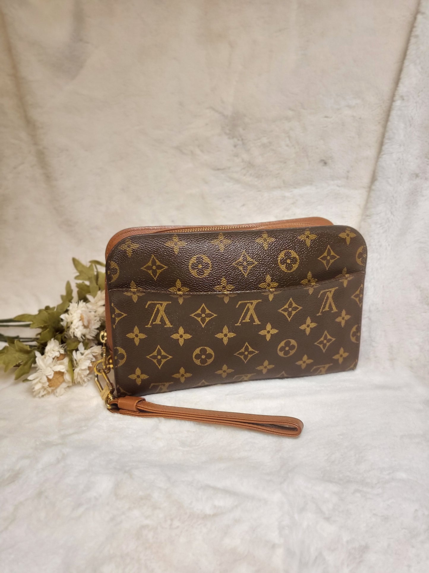 Authentic pre-owned Louis Vuitton Orsay monogram clutch