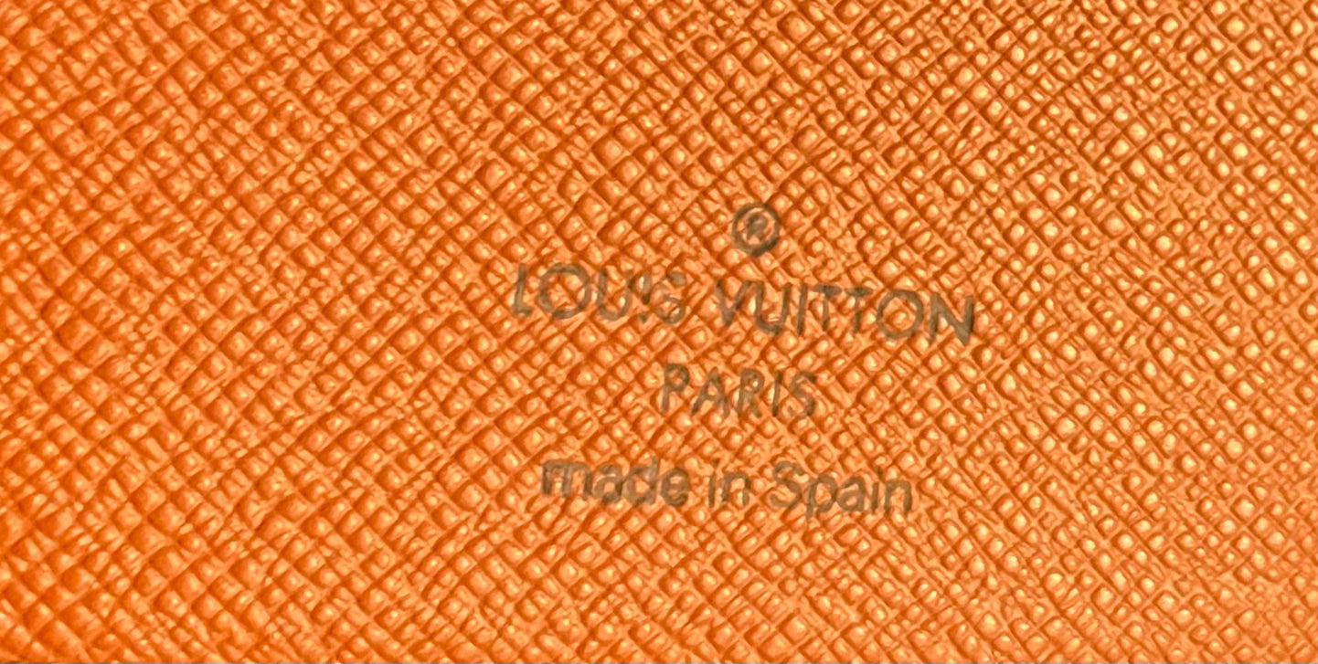 Louis Vuitton passport holder