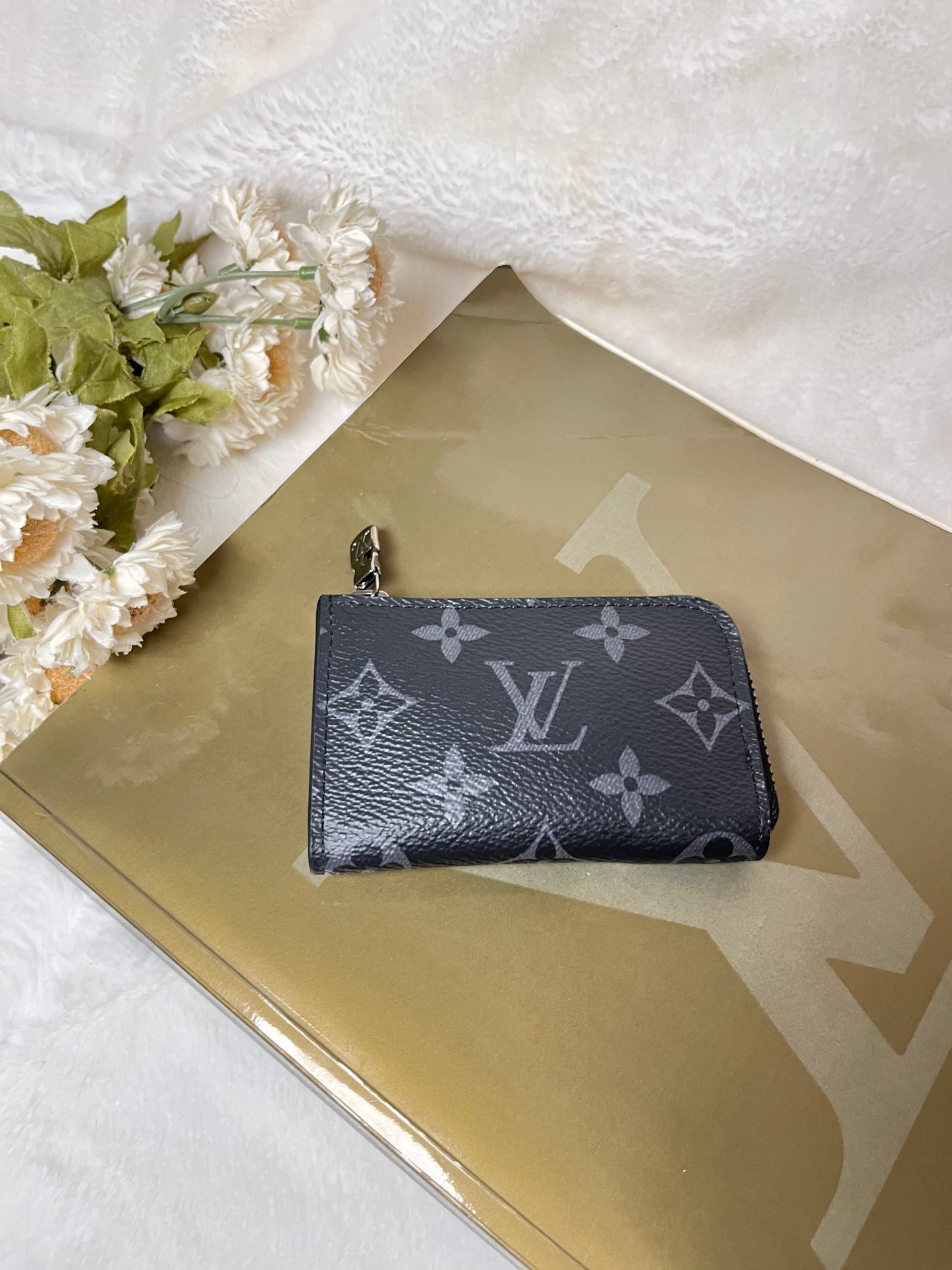 Authentic pre-owned Louis Vuitton Eclipse Porte Monnaie Jour coin purse