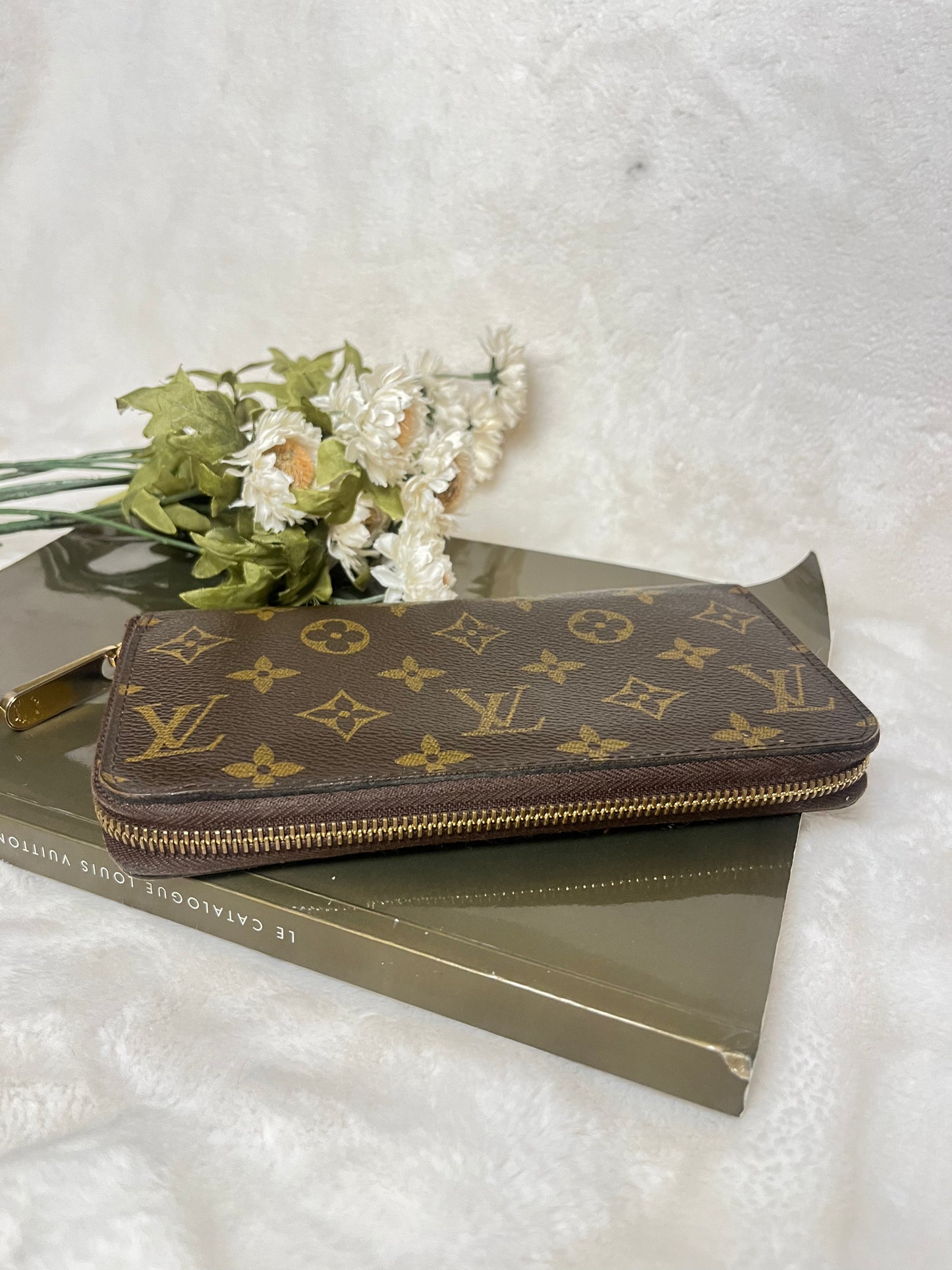 Authentic pre-owned Louis Vuitton zippy wallet