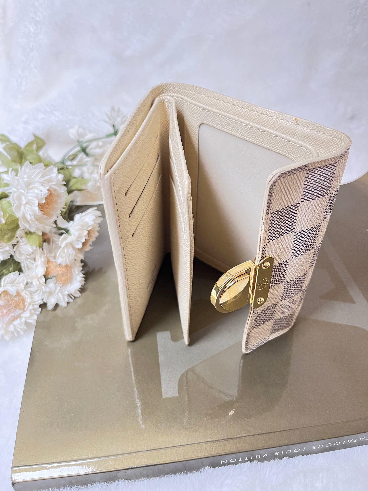 Authentic pre-owned Louis Vuitton Koala wallet