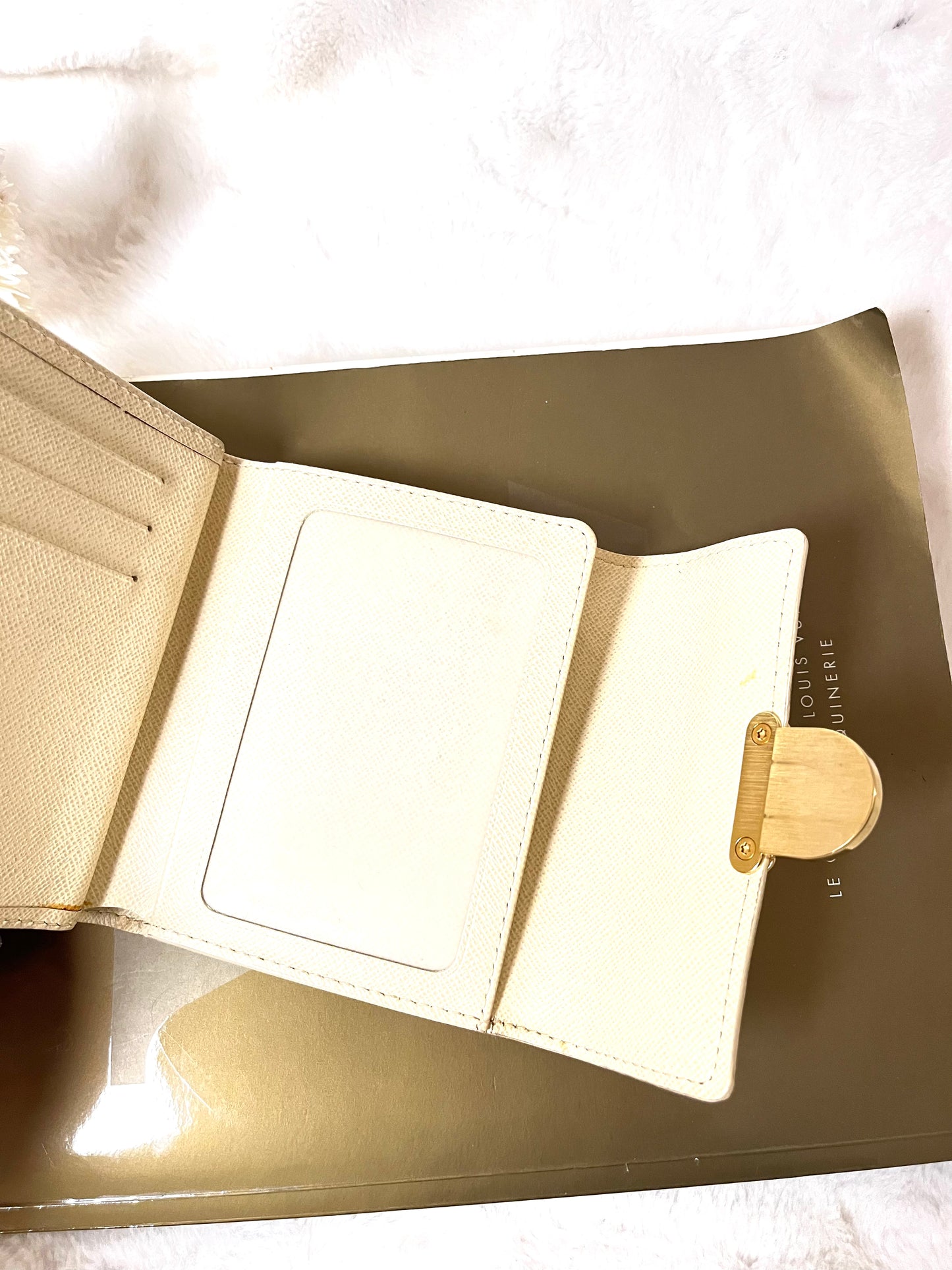Authentic pre-owned Louis Vuitton Koala wallet