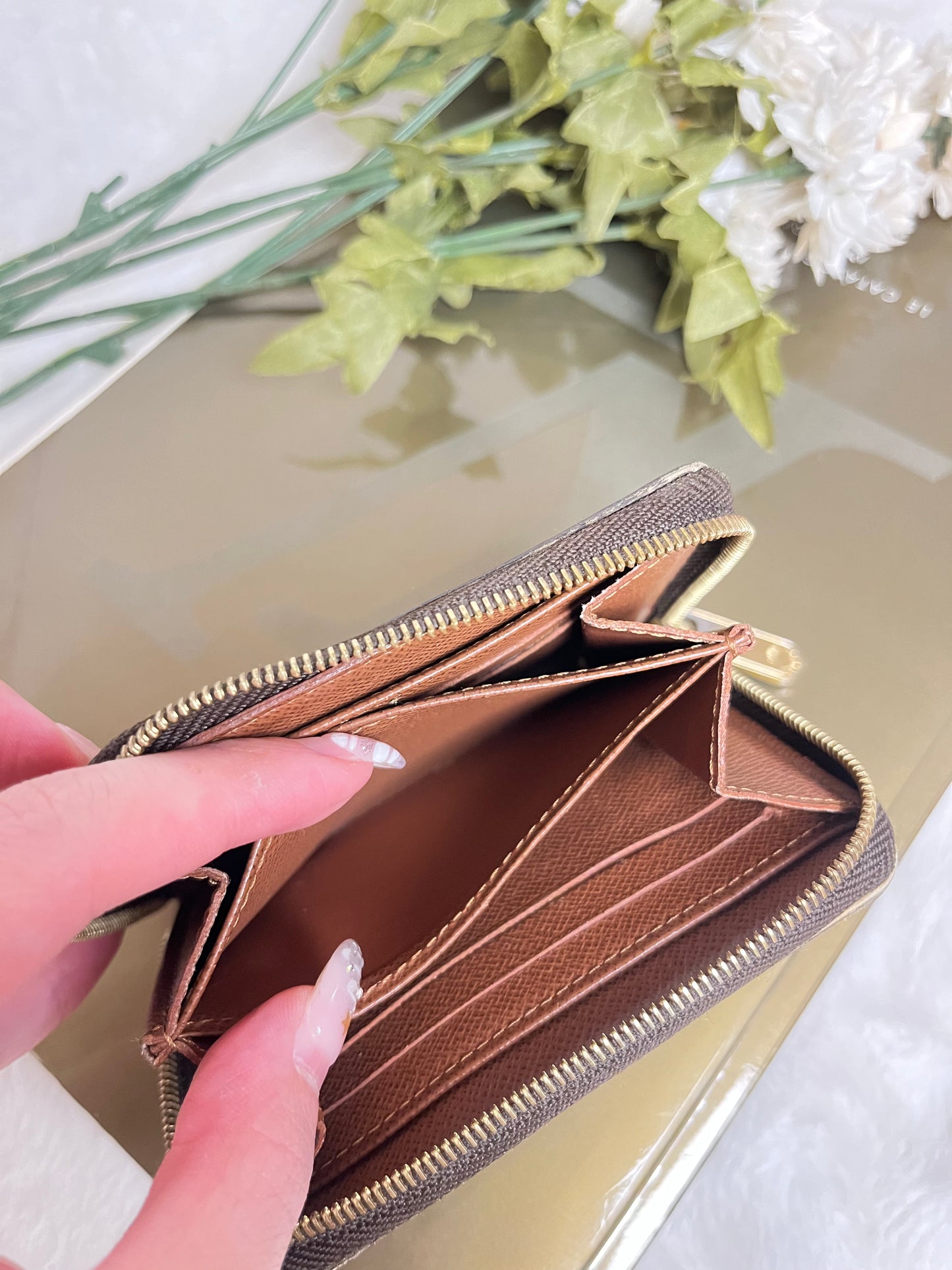 Authentic pre-owned Louis Vuitton mini compact zippy wallet
