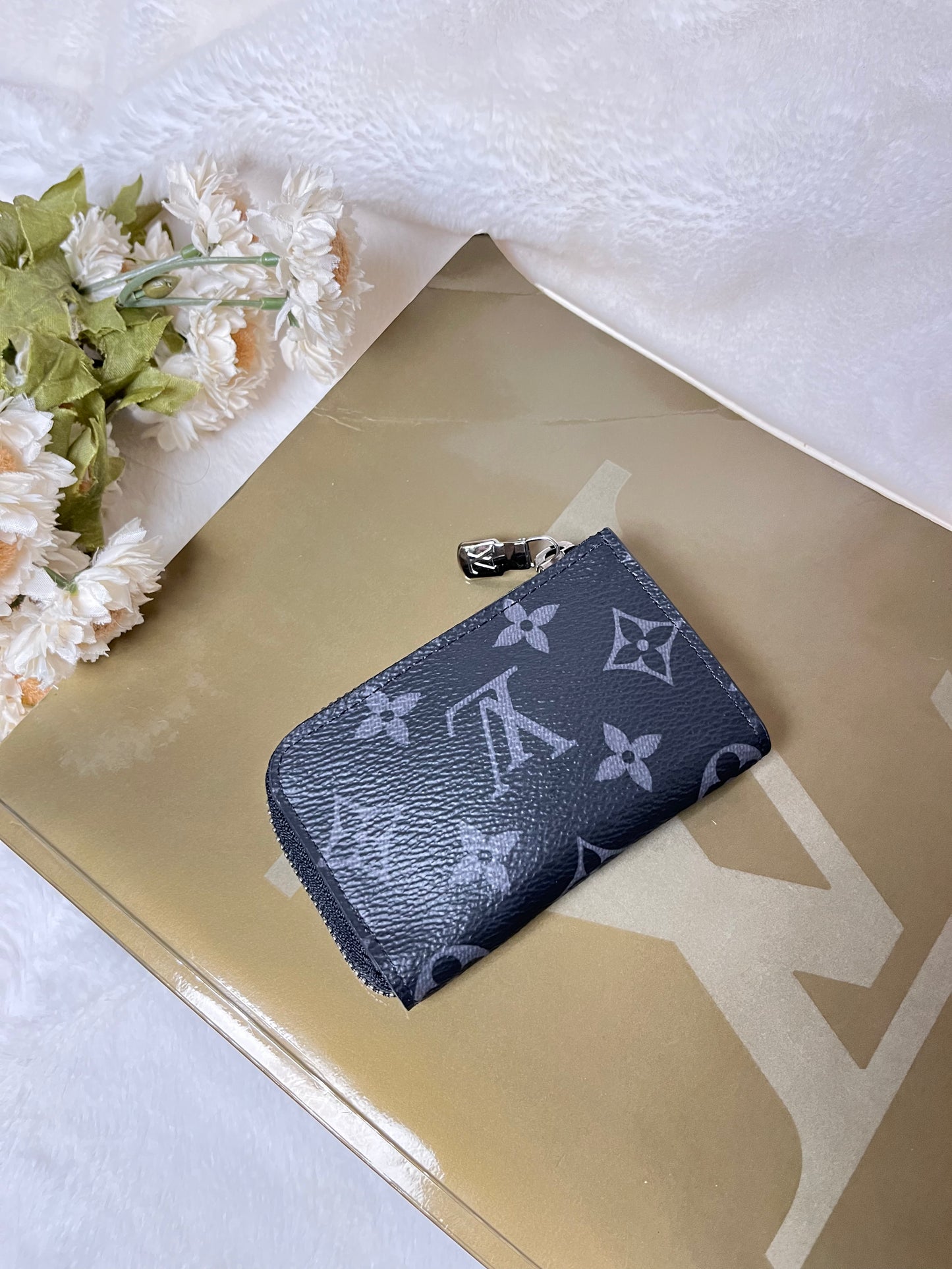 Authentic pre-owned Louis Vuitton Eclipse Porte Monnaie Jour coin purse