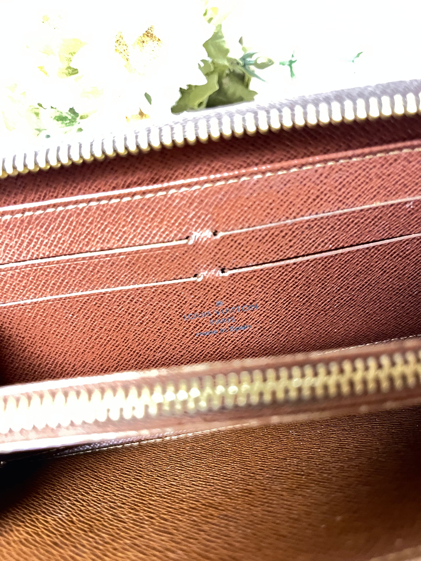 Authentic pre-owned Louis Vuitton zippy compact wallet