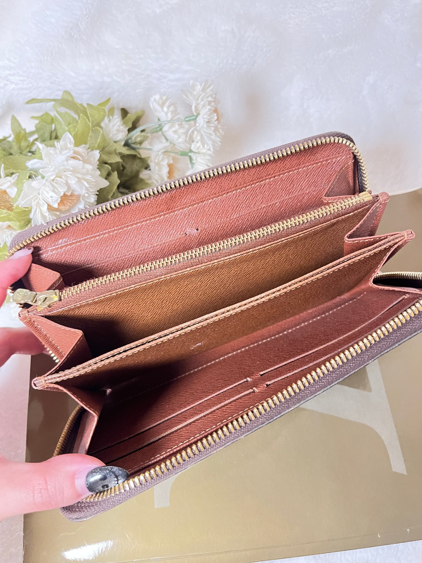 Authentic pre-owned Louis Vuitton zippy compact wallet