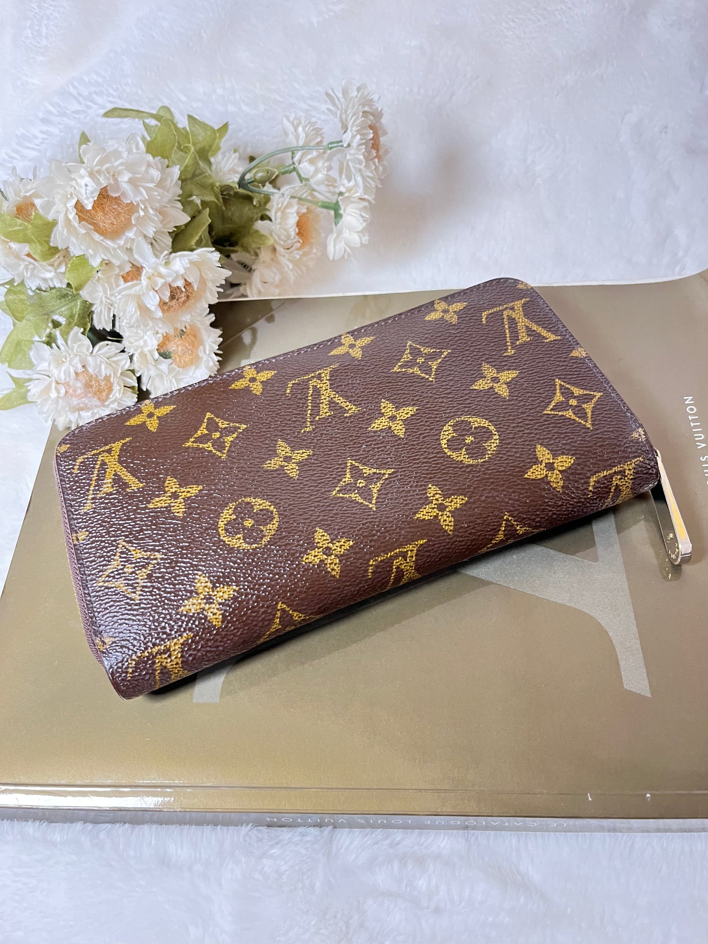 Authentic pre-owned Louis Vuitton zippy compact wallet