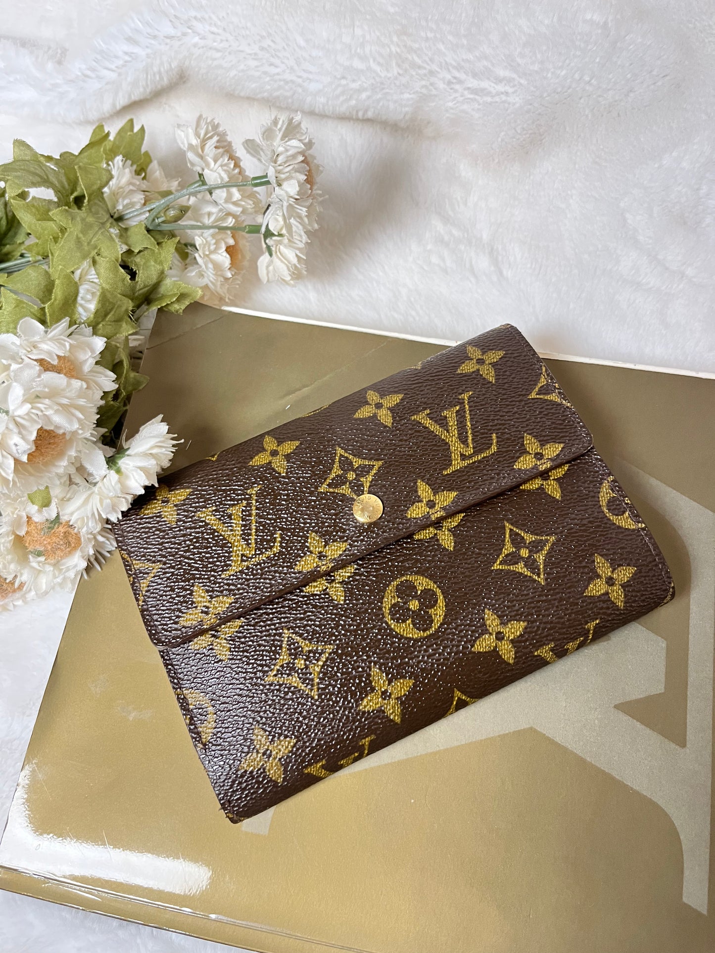 Authentic pre-owned Louis Vuitton Tresor papier trifold wallet