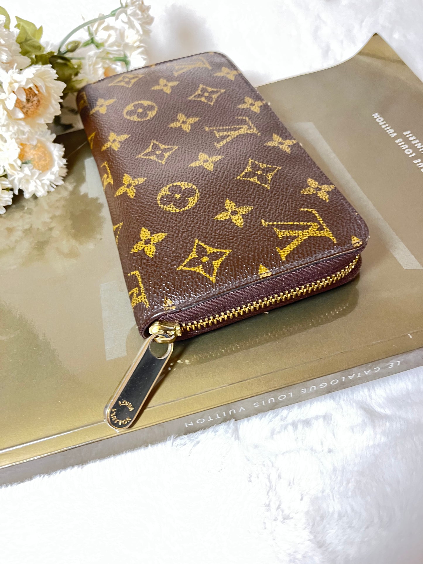 Authentic pre-owned Louis Vuitton zippy compact wallet