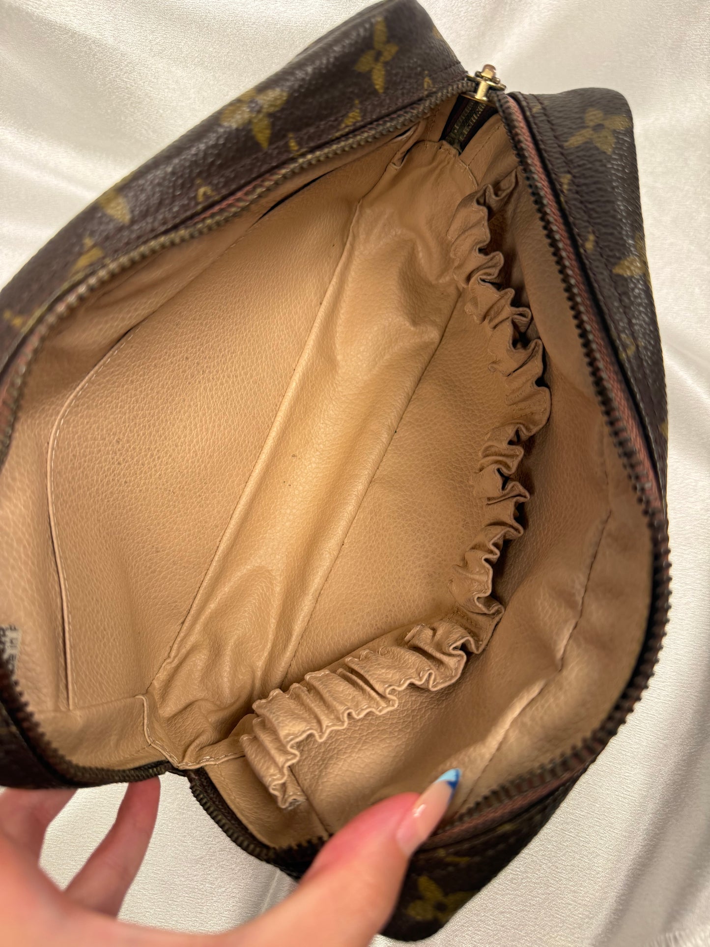 Louis Vuitton Trouss 23 cosmetic pouch