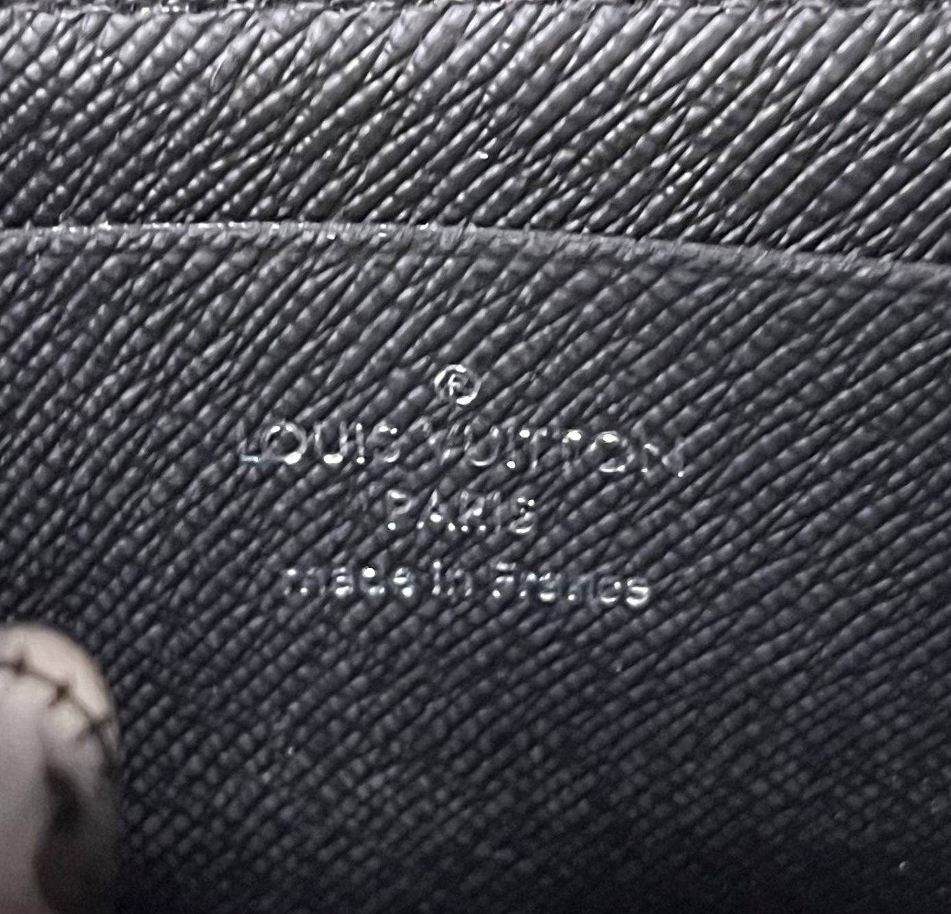 Authentic pre-owned Louis Vuitton Eclipse Porte Monnaie Jour coin purse