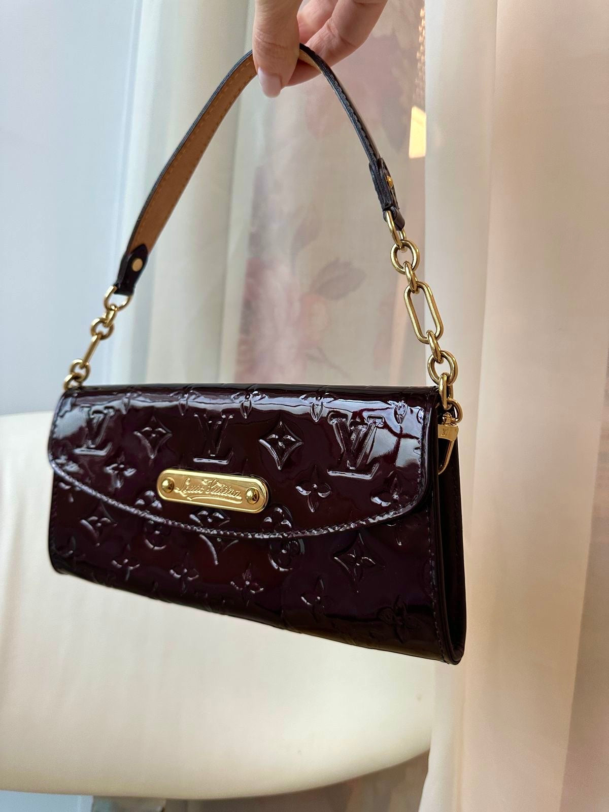 Louis Vuitton Sunset Boulevard clutch bag