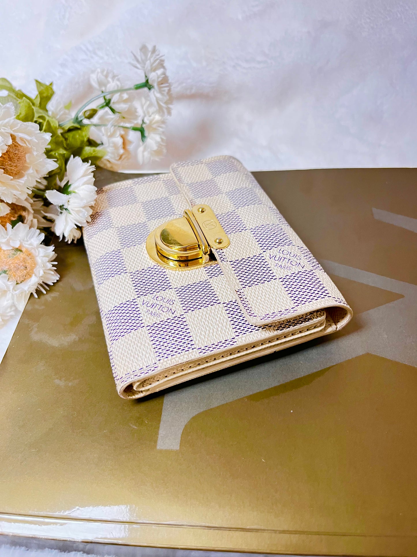 Authentic pre-owned Louis Vuitton Koala wallet