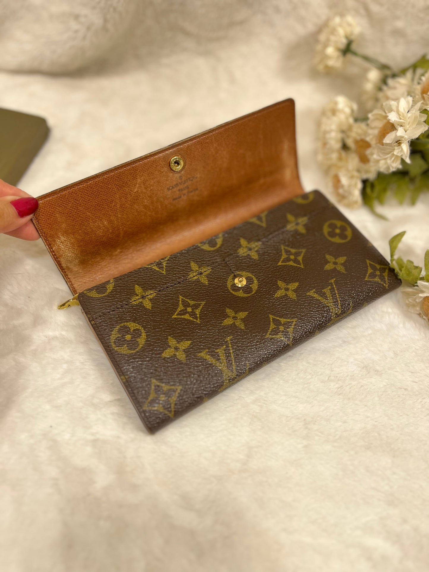 Authentic pre-owned Louis Vuitton Sarah wallet