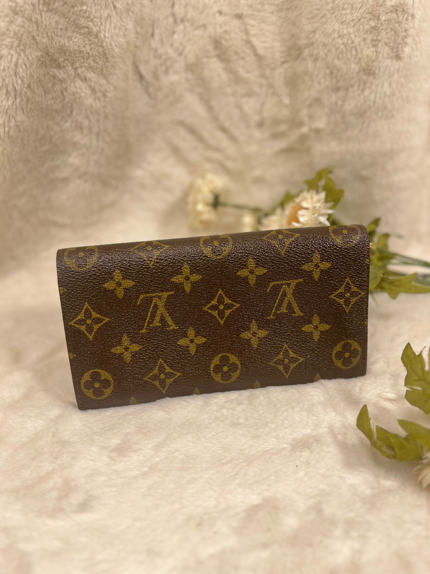 Authentic pre-owned Louis Vuitton Sarah wallet