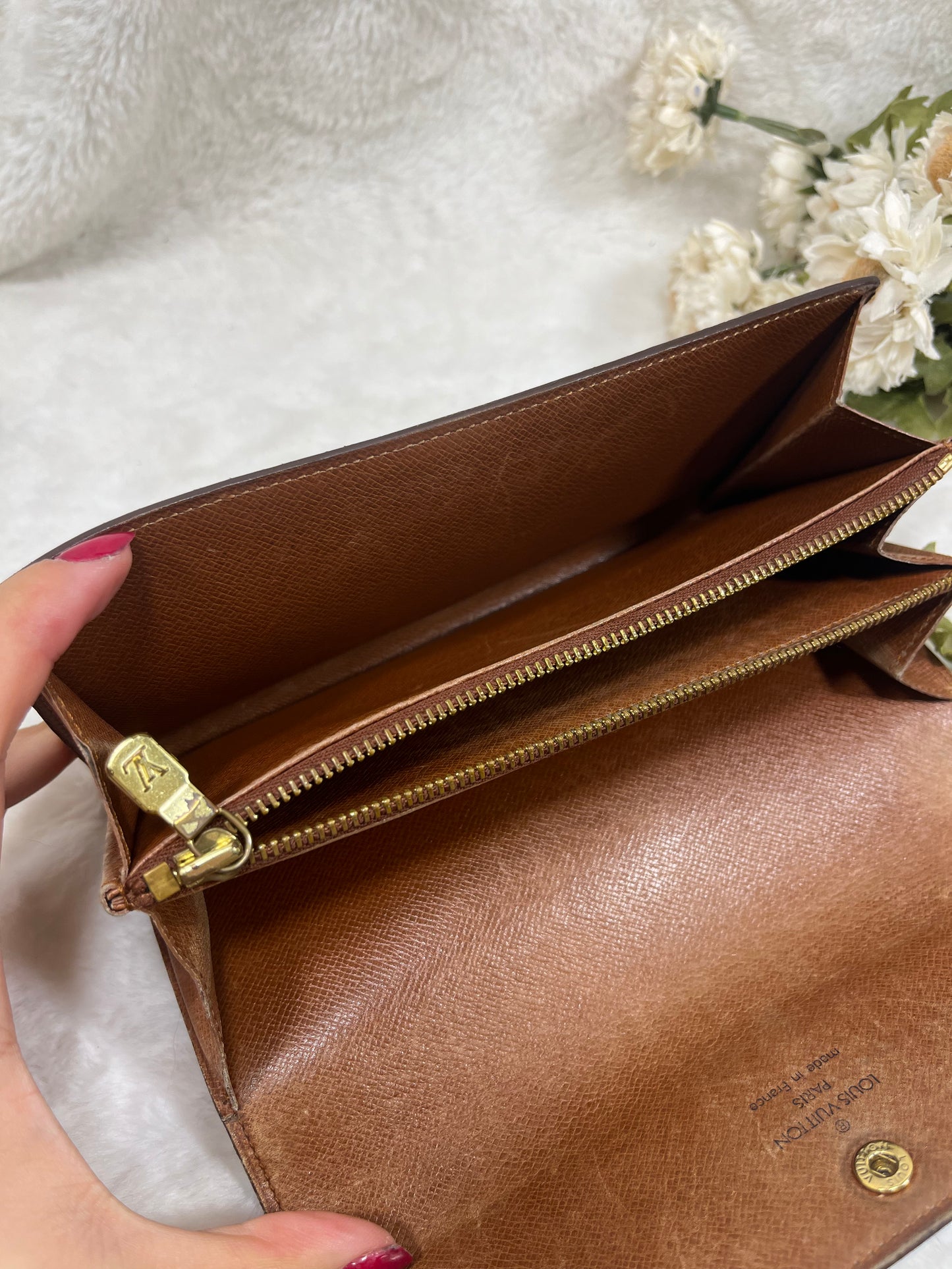 Authentic pre-owned Louis Vuitton Sarah wallet