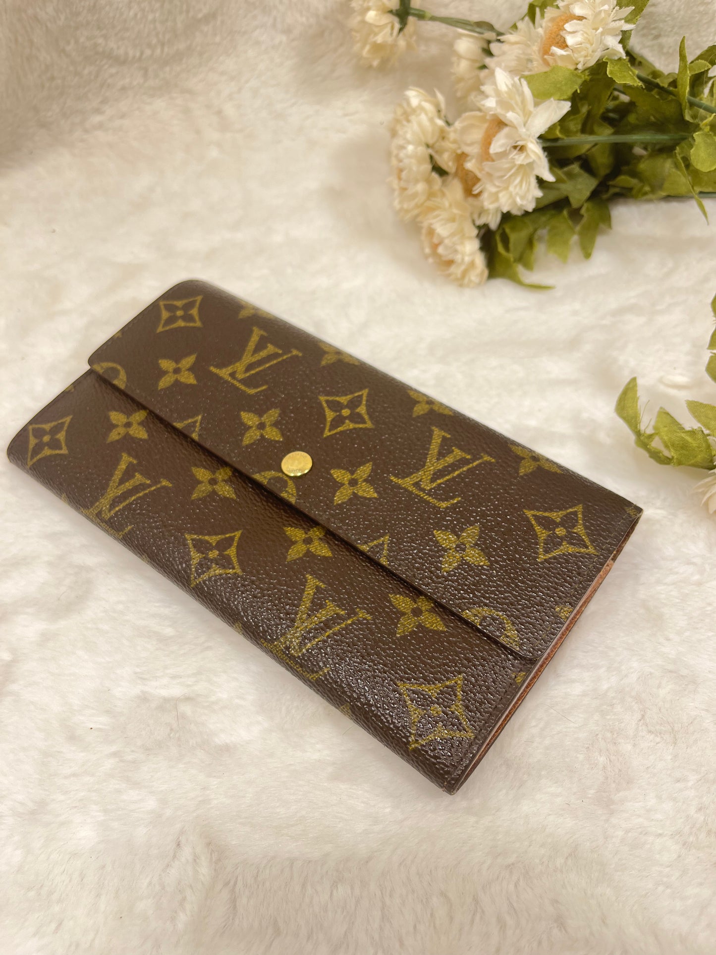 Authentic pre-owned Louis Vuitton Sarah wallet