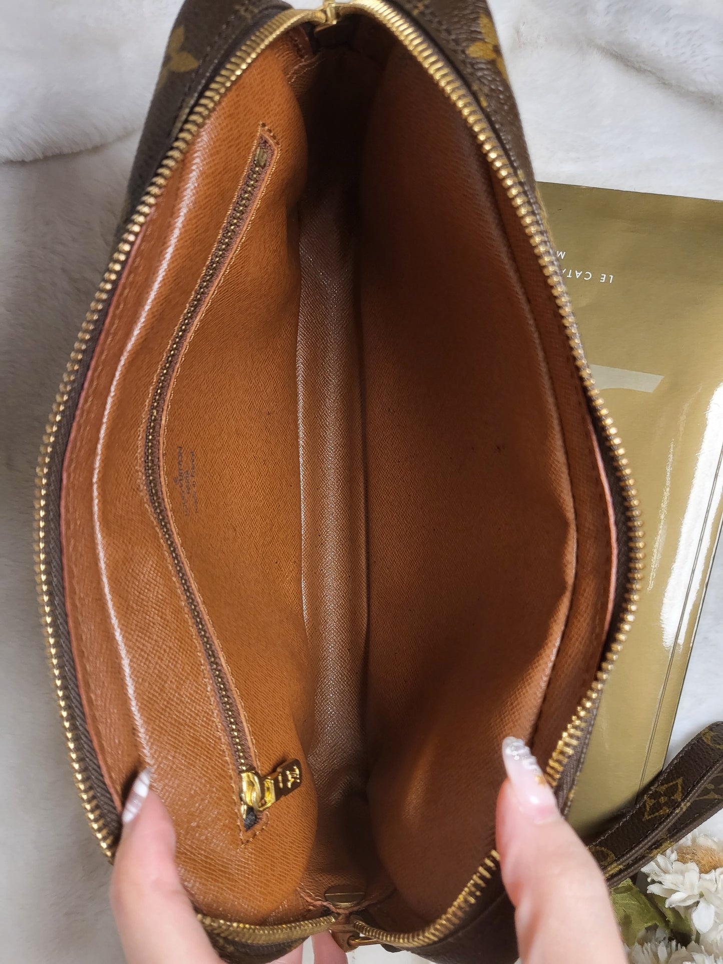 Authentic pre-owned Louis Vuitton Marly Dragonne clutch