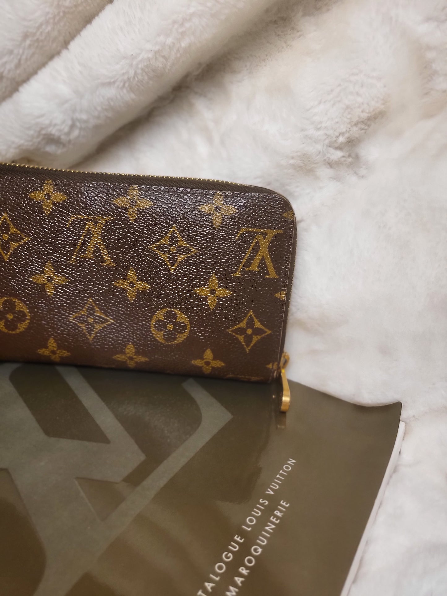Authentic pre-owned Louis Vuitton Zippy compact wallet