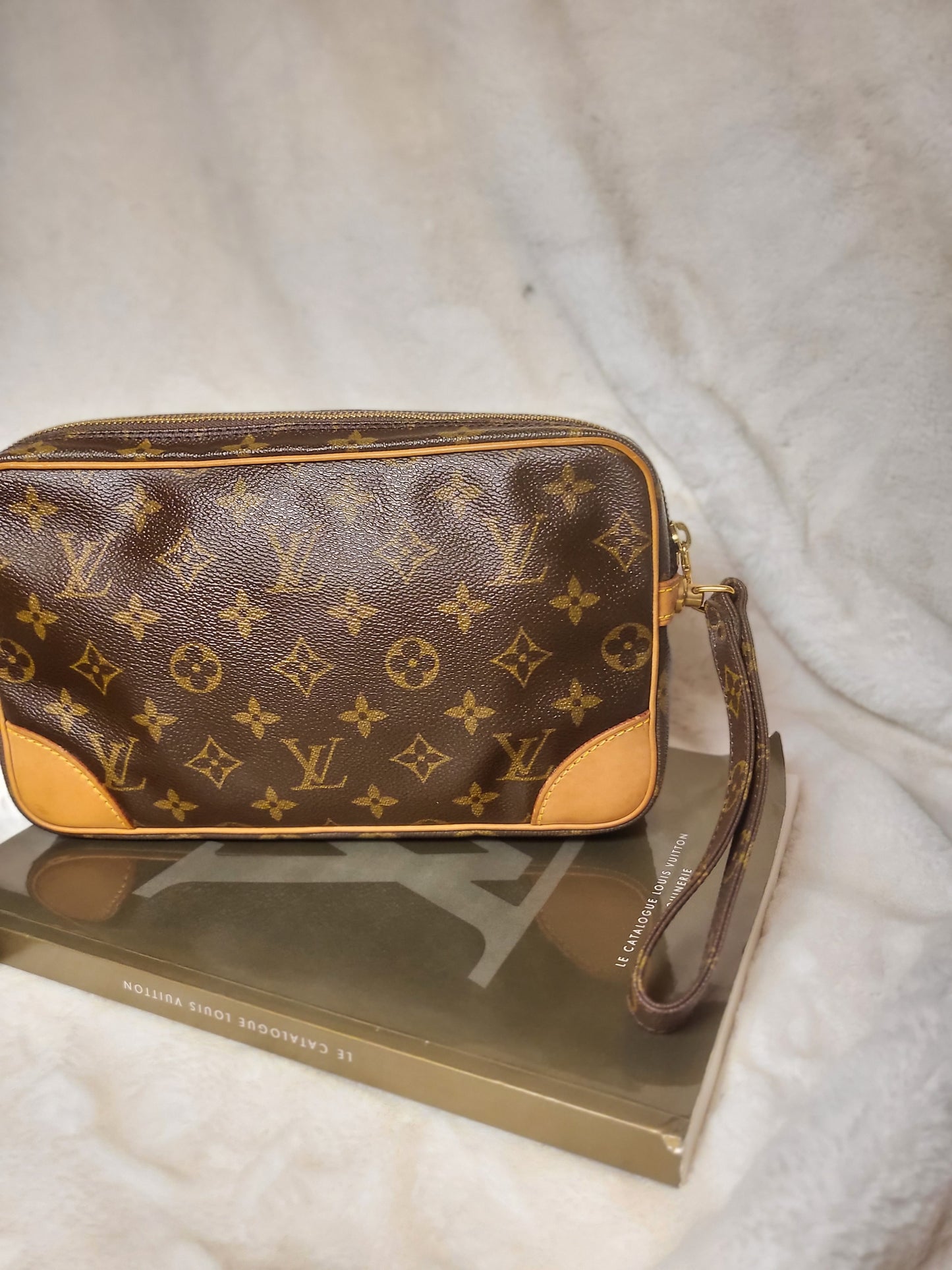 Authentic pre-owned Louis Vuitton Marly Dragonne clutch