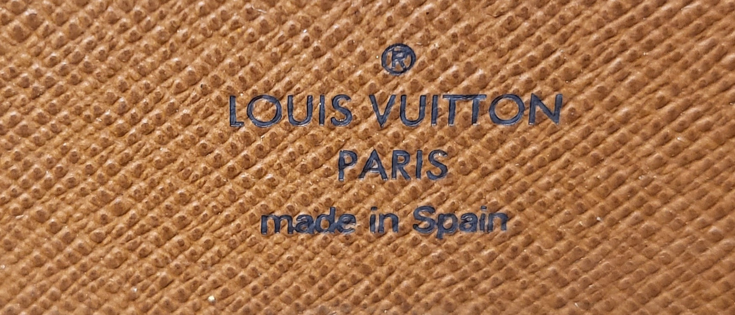 Authentic pre-owned Louis Vuitton Zippy compact wallet