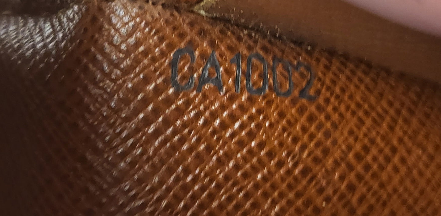 Authentic pre-owned Louis Vuitton Pochette passport wallet