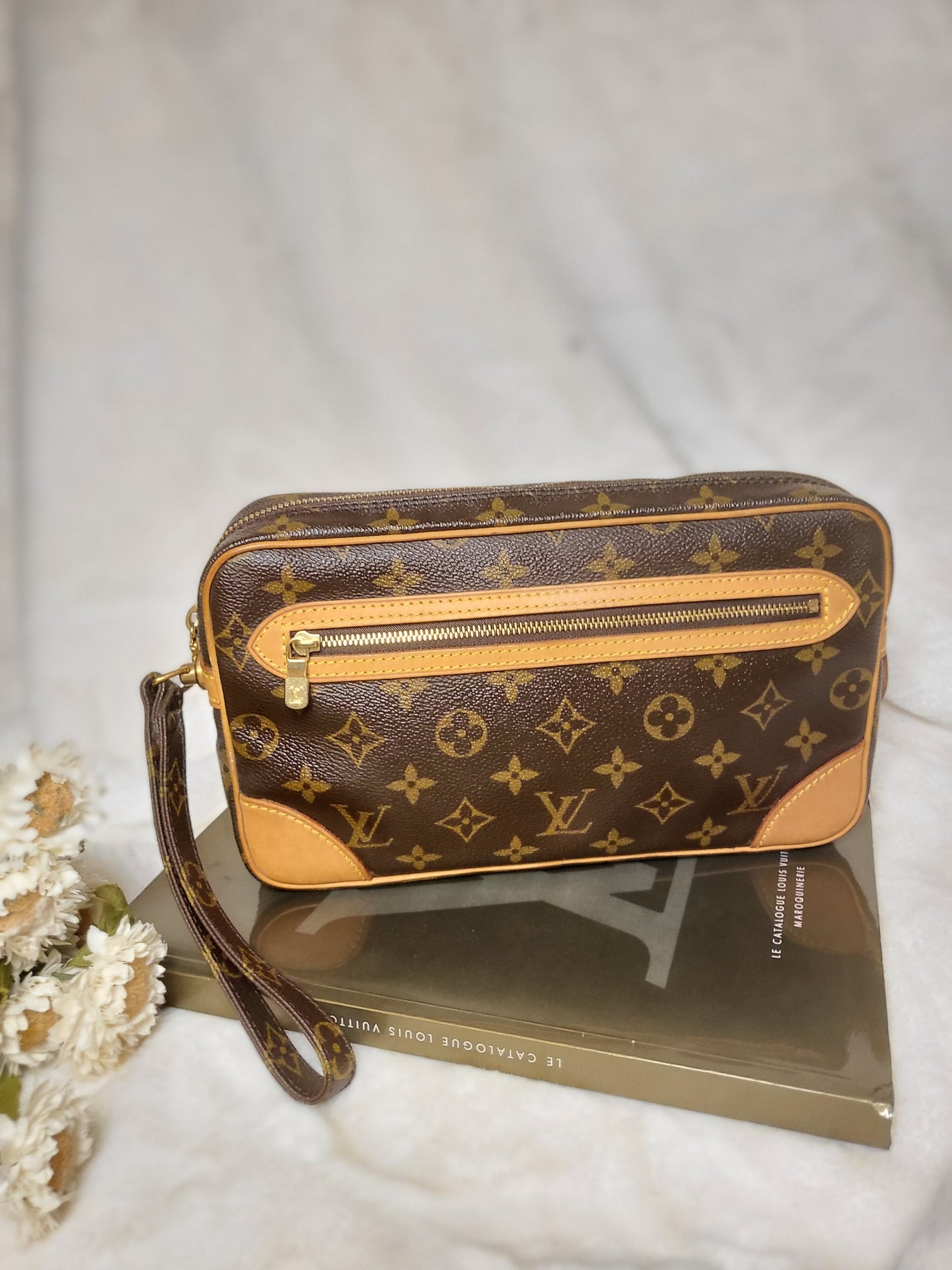 Authentic pre-owned Louis Vuitton Marly Dragonne clutch