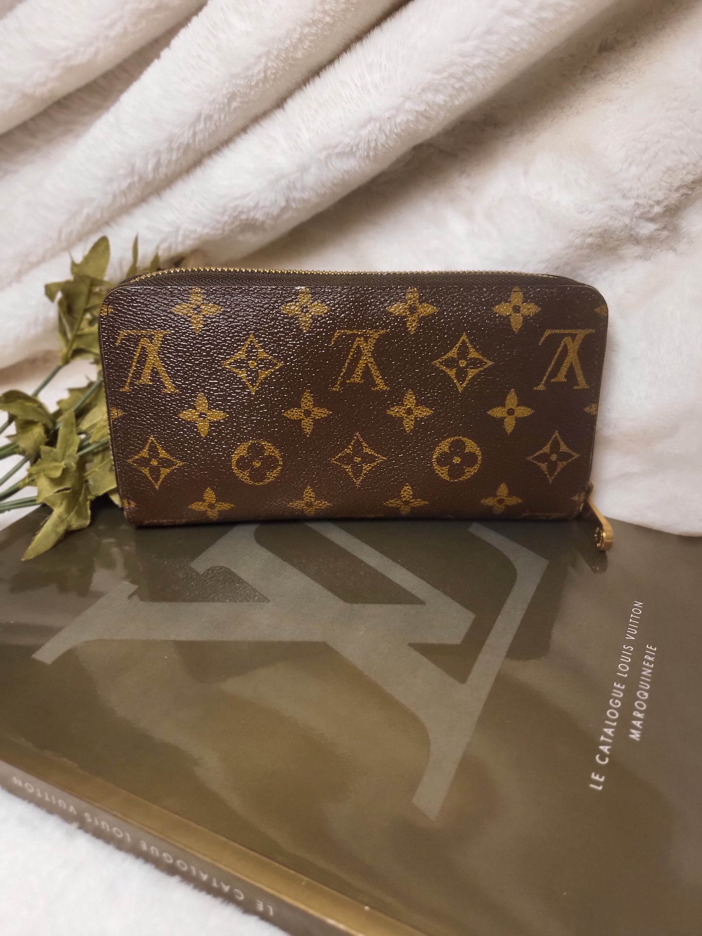 Authentic pre-owned Louis Vuitton Zippy compact wallet