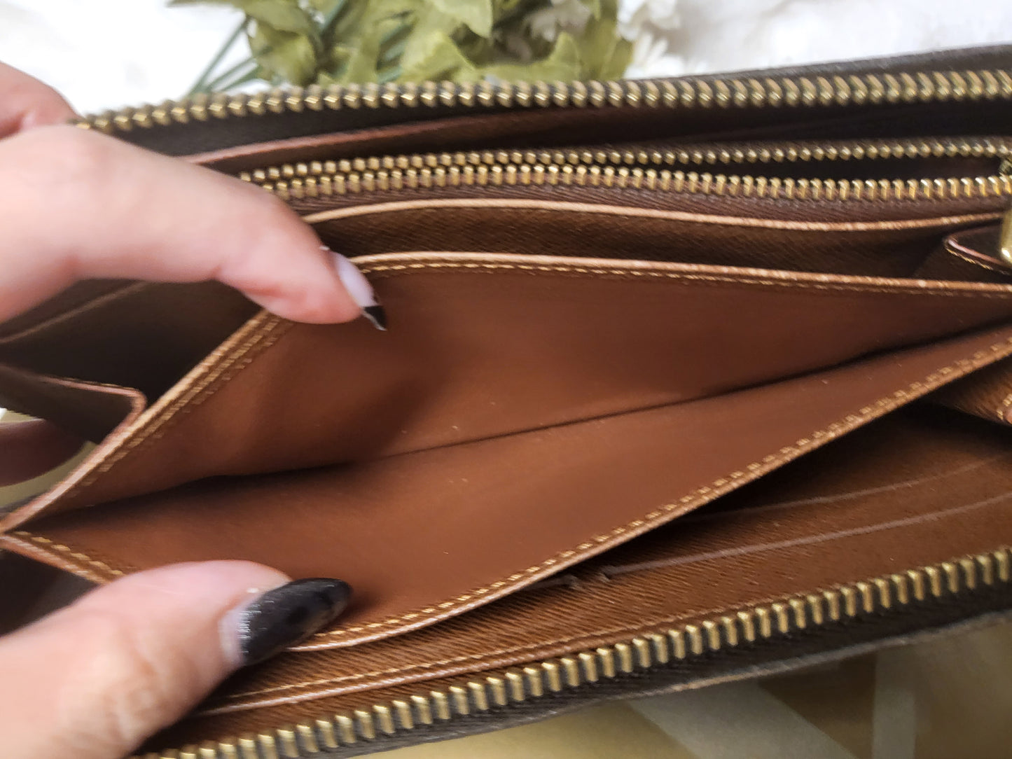 Authentic pre-owned Louis Vuitton Zippy compact wallet
