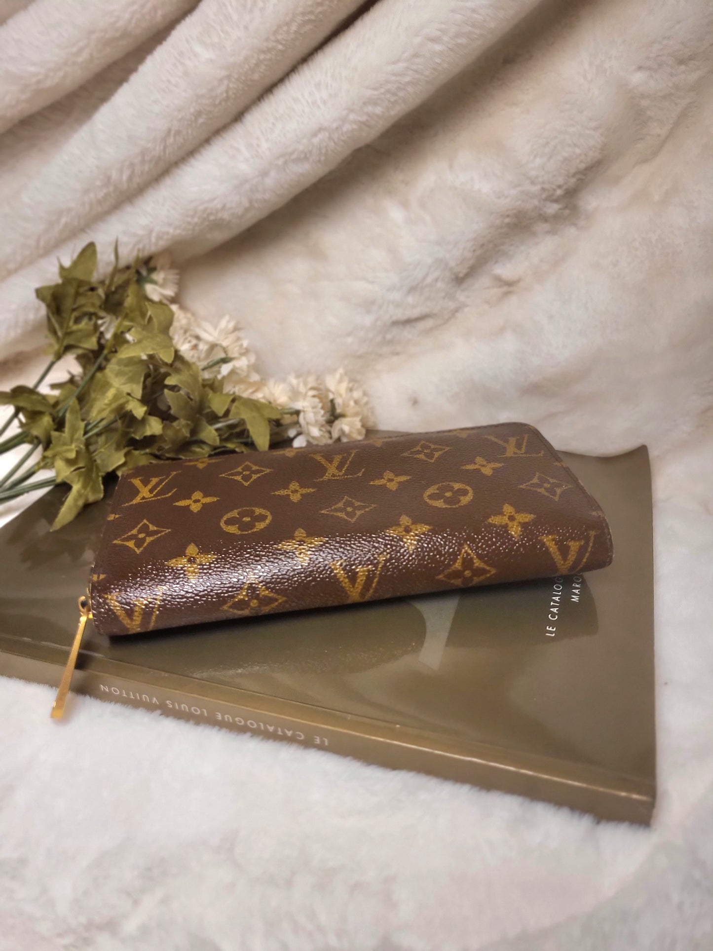 Authentic pre-owned Louis Vuitton Zippy compact wallet