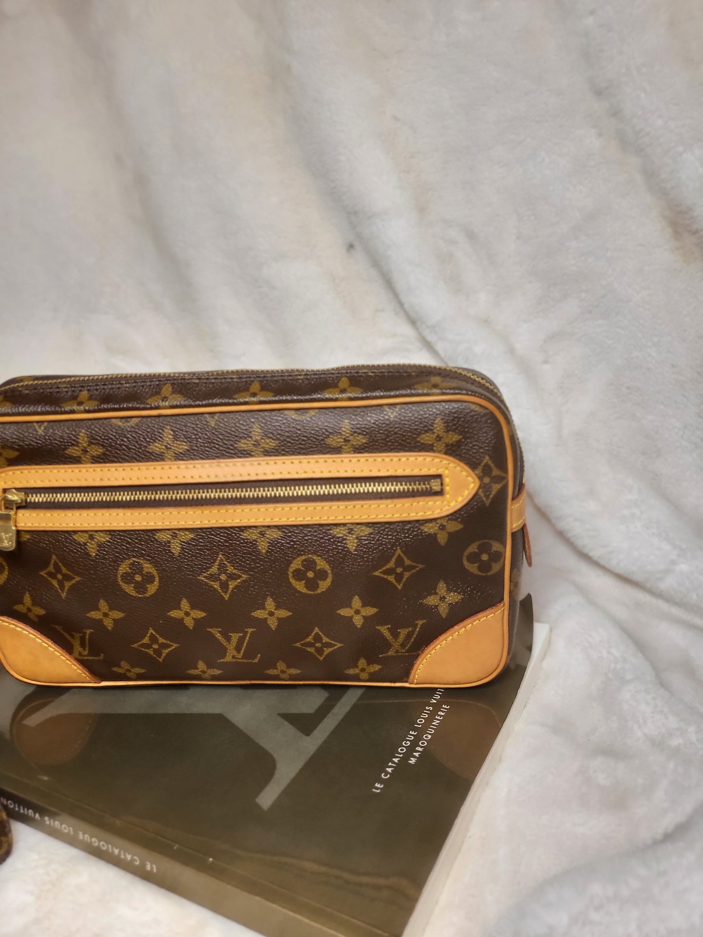 Authentic pre-owned Louis Vuitton Marly Dragonne clutch