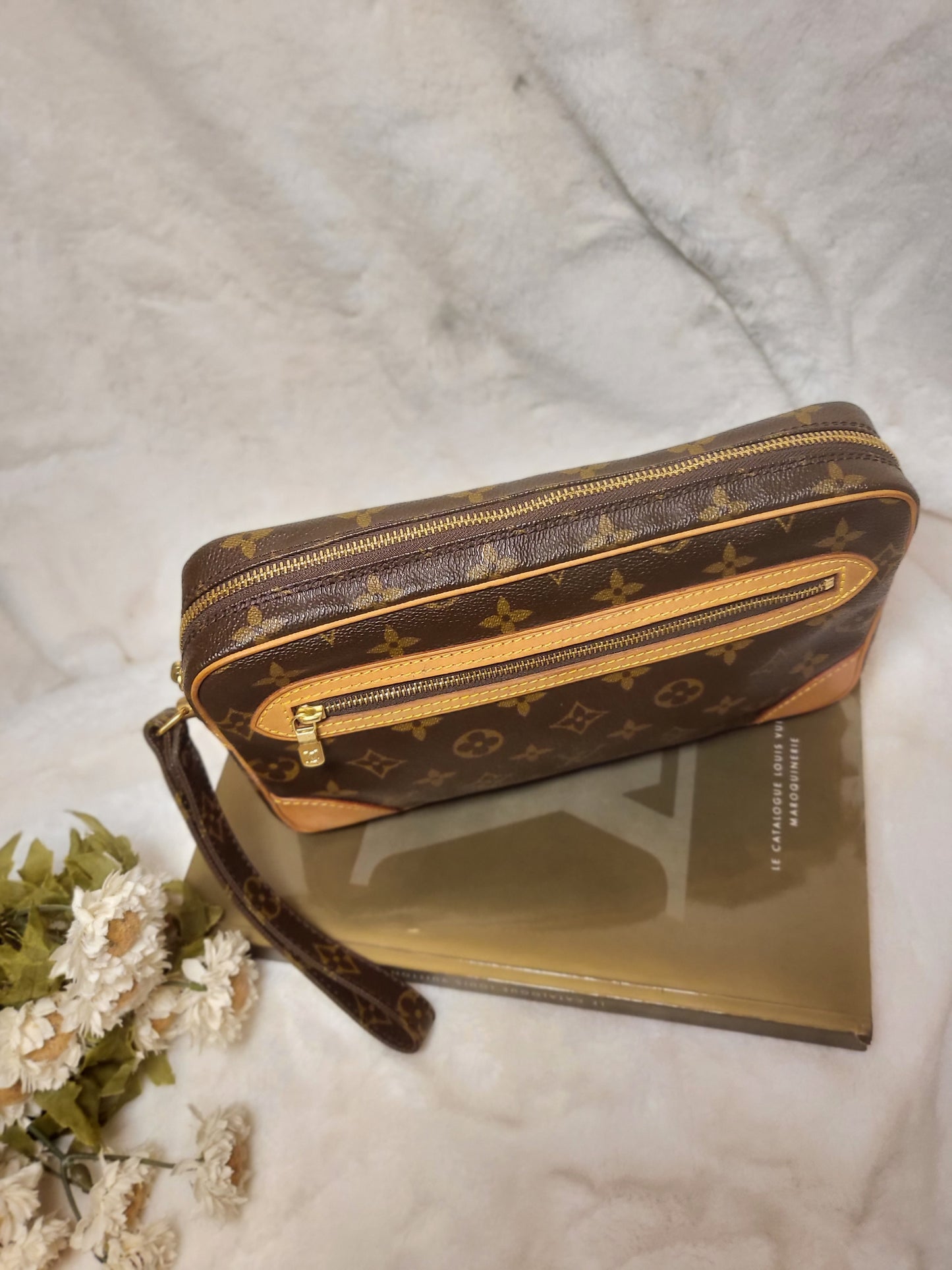 Authentic pre-owned Louis Vuitton Marly Dragonne clutch