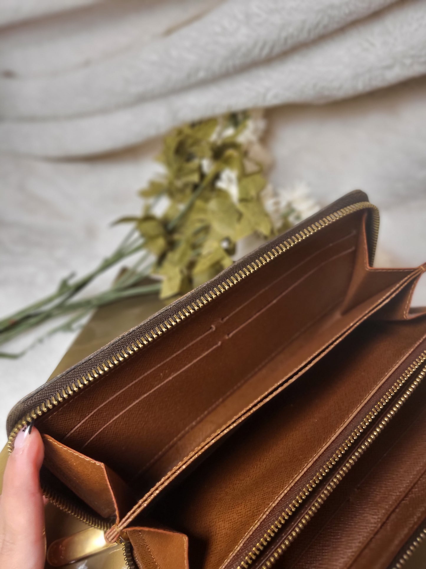 Authentic pre-owned Louis Vuitton Zippy compact wallet