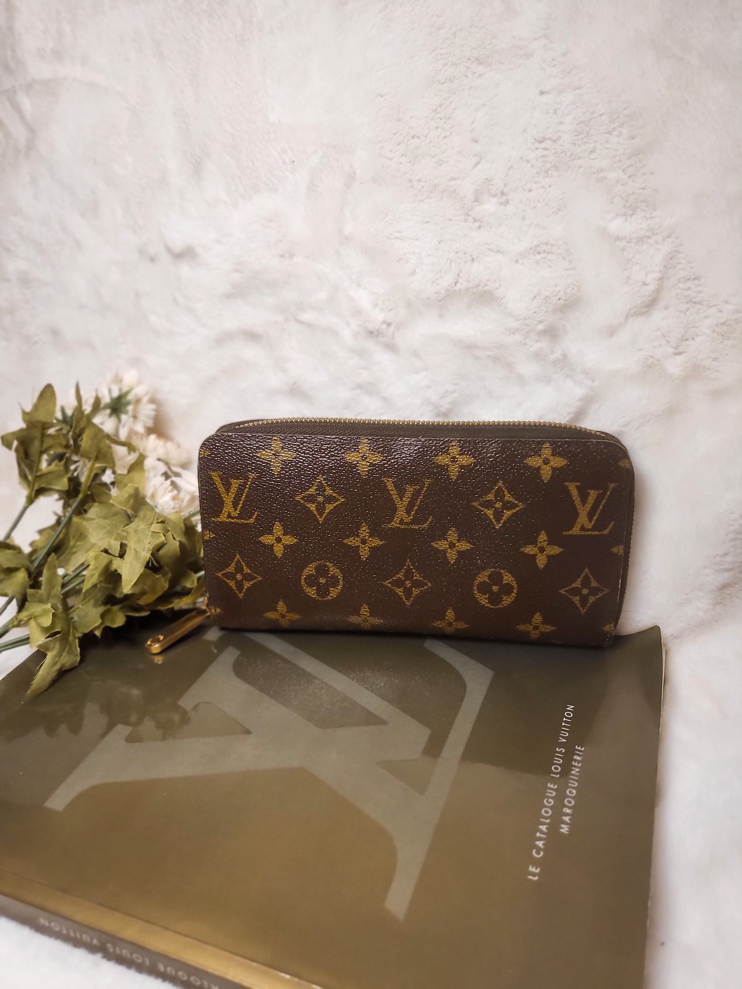 Authentic pre-owned Louis Vuitton Zippy compact wallet
