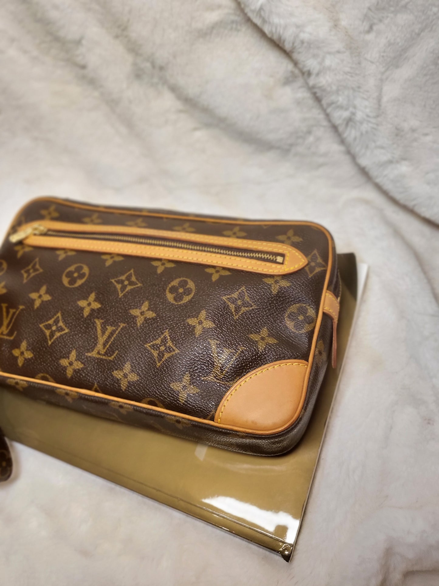 Authentic pre-owned Louis Vuitton Marly Dragonne clutch