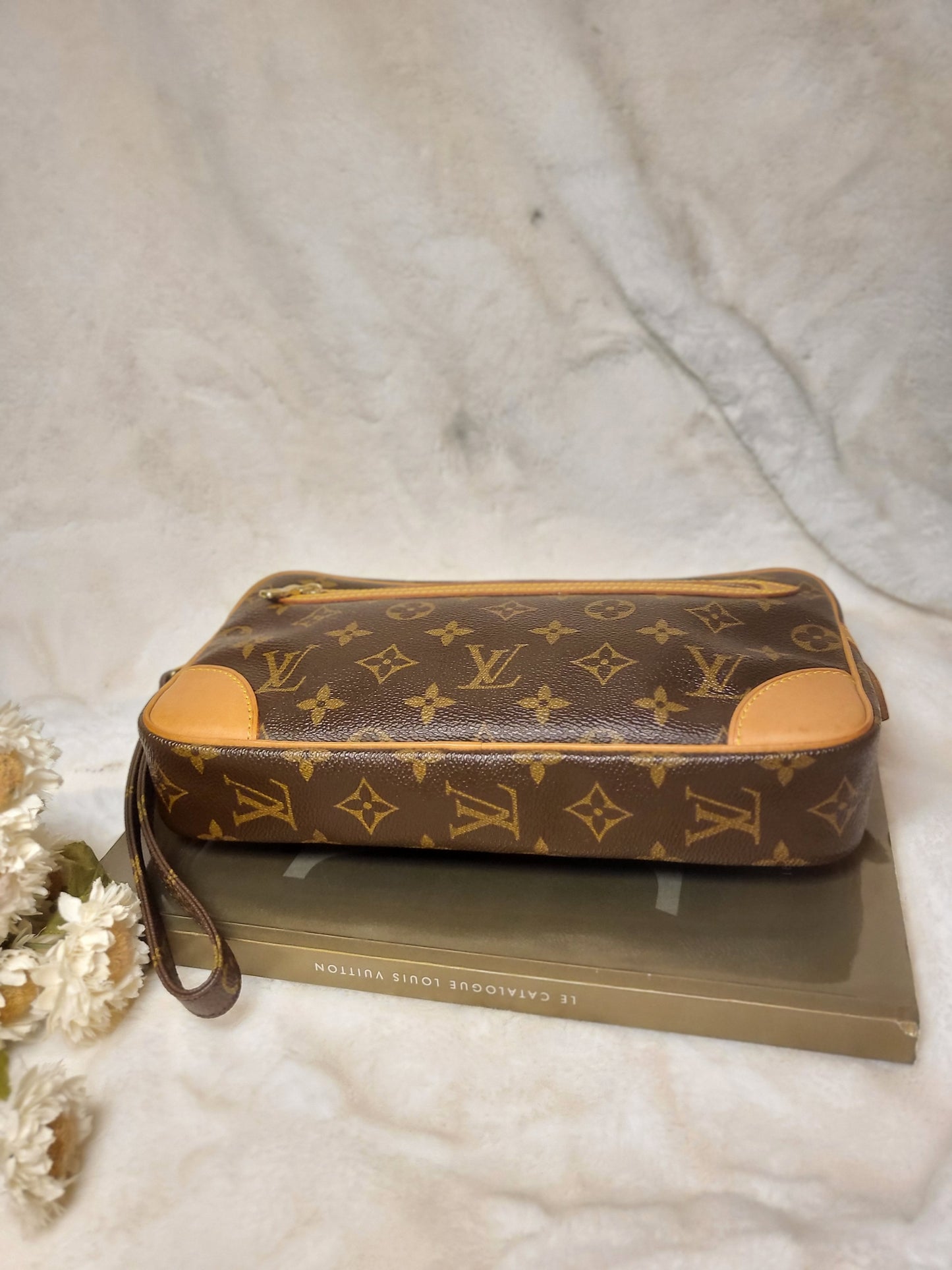Authentic pre-owned Louis Vuitton Marly Dragonne clutch