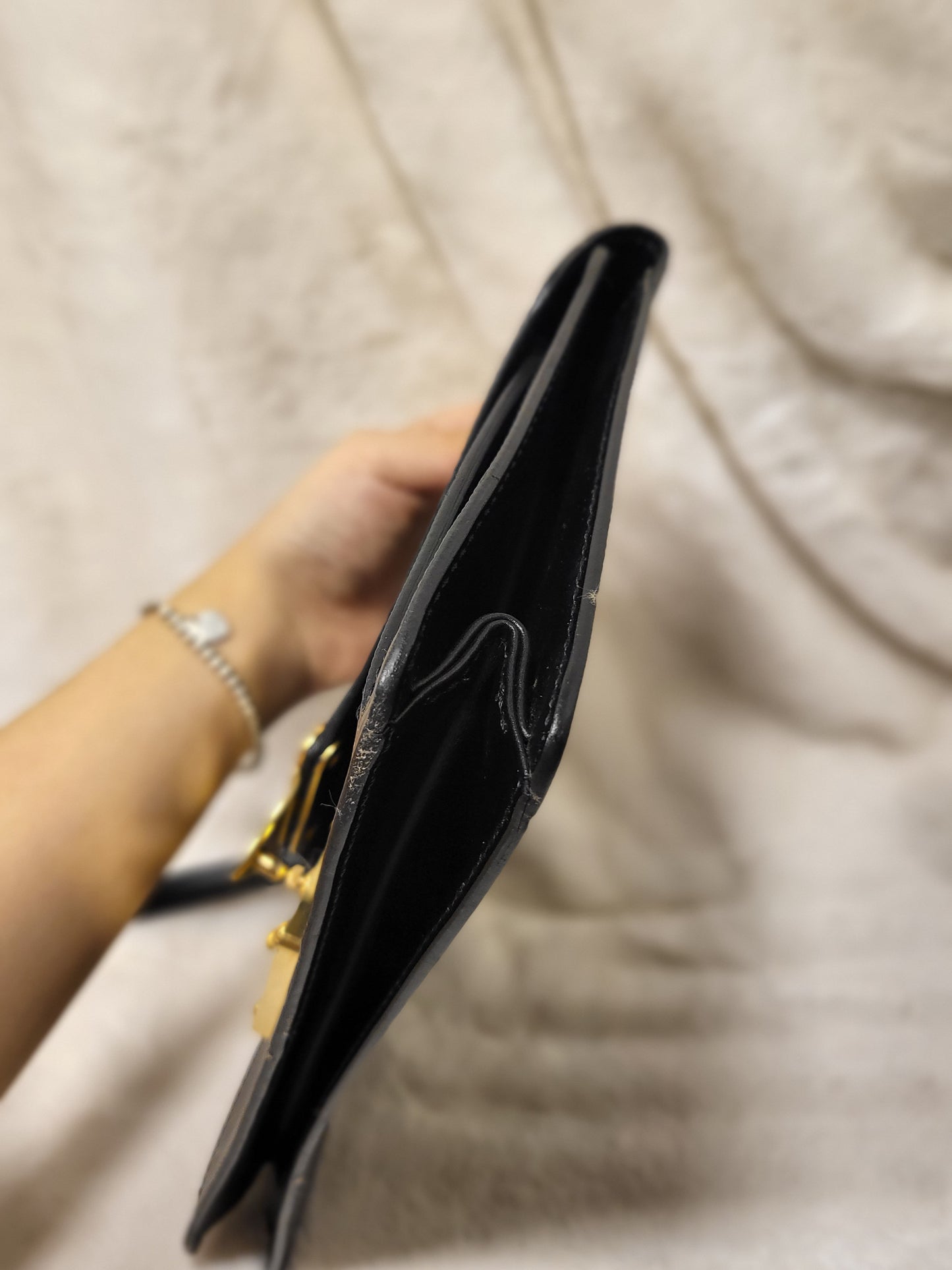 Authentic pre-owned Louis Vuitton serie Dragonne clutch black epi