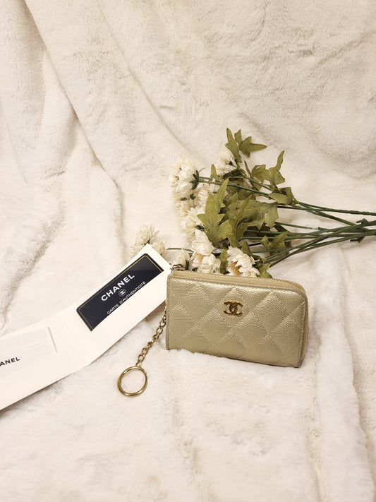 Authentic pre-owned Chanel zippy key cle coin purse card holder