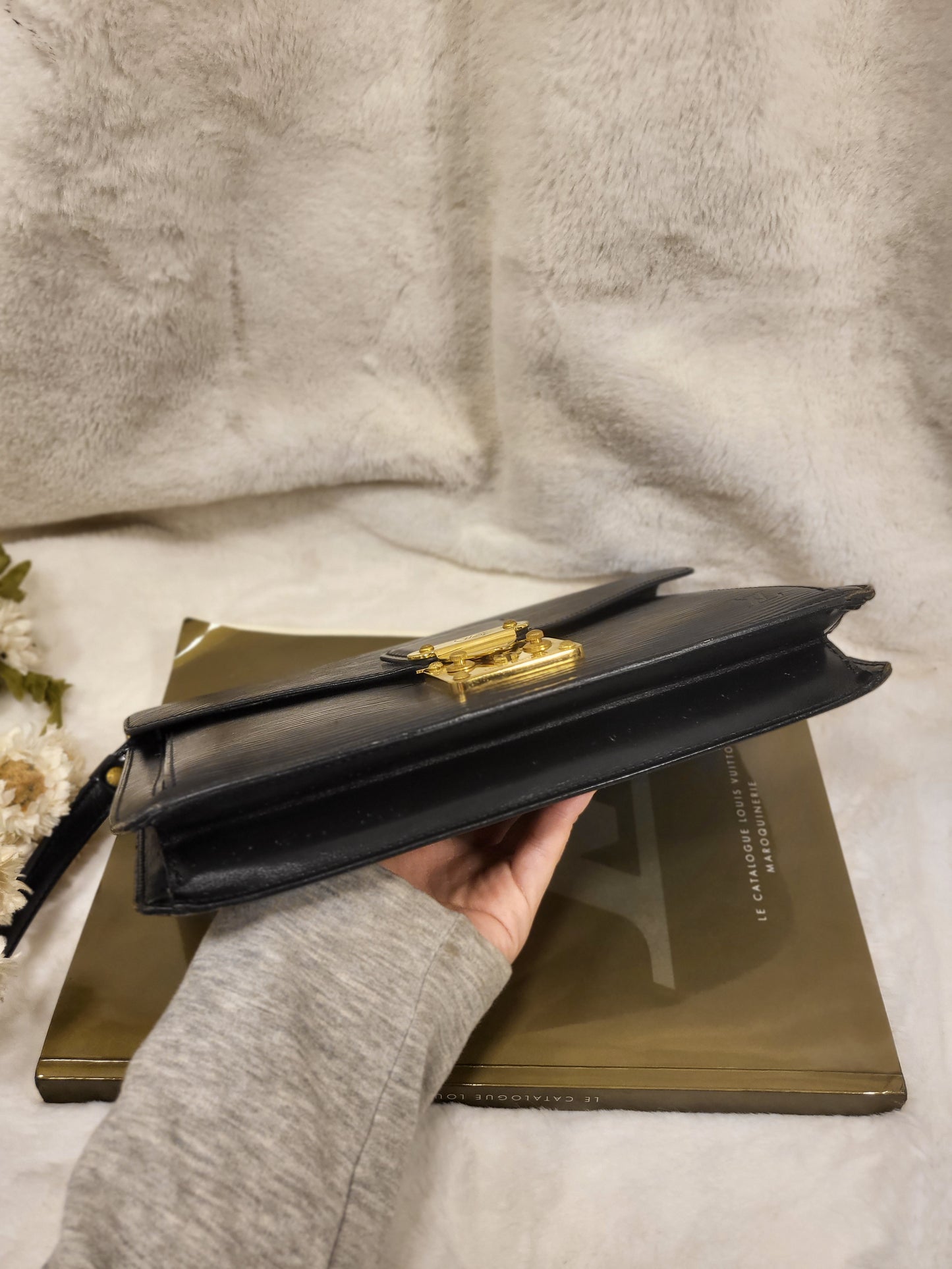 Authentic pre-owned Louis Vuitton Serie Dragonne noir epi clutch