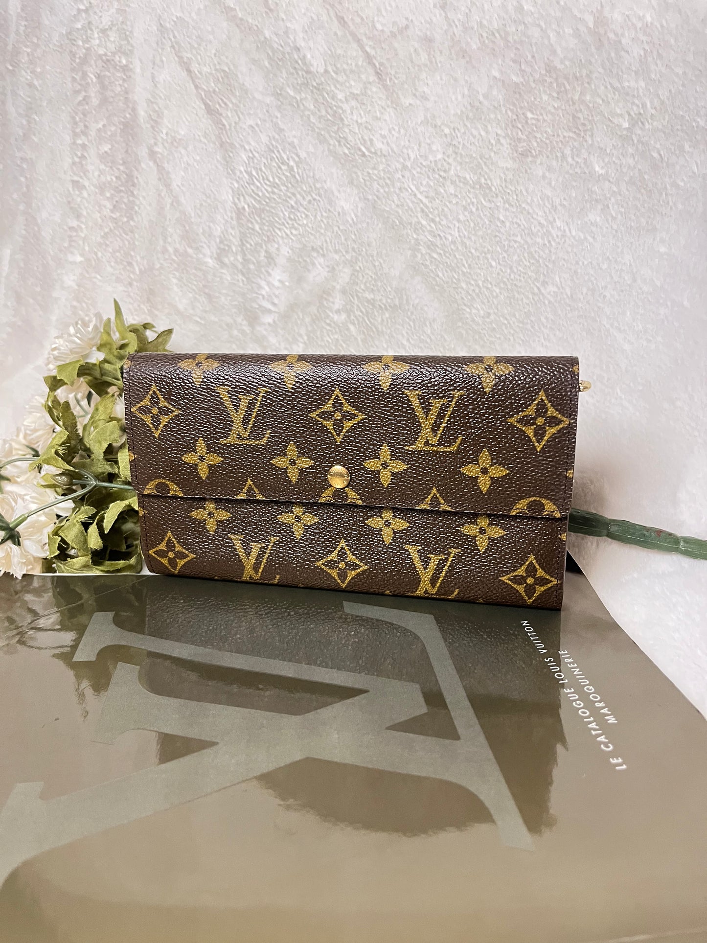 Authentic pre-owned Louis Vuitton Sarah Wallet