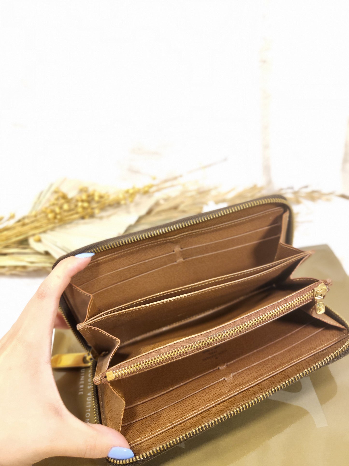 Authentic pre-owned Louis Vuitton Zippy compact wallet