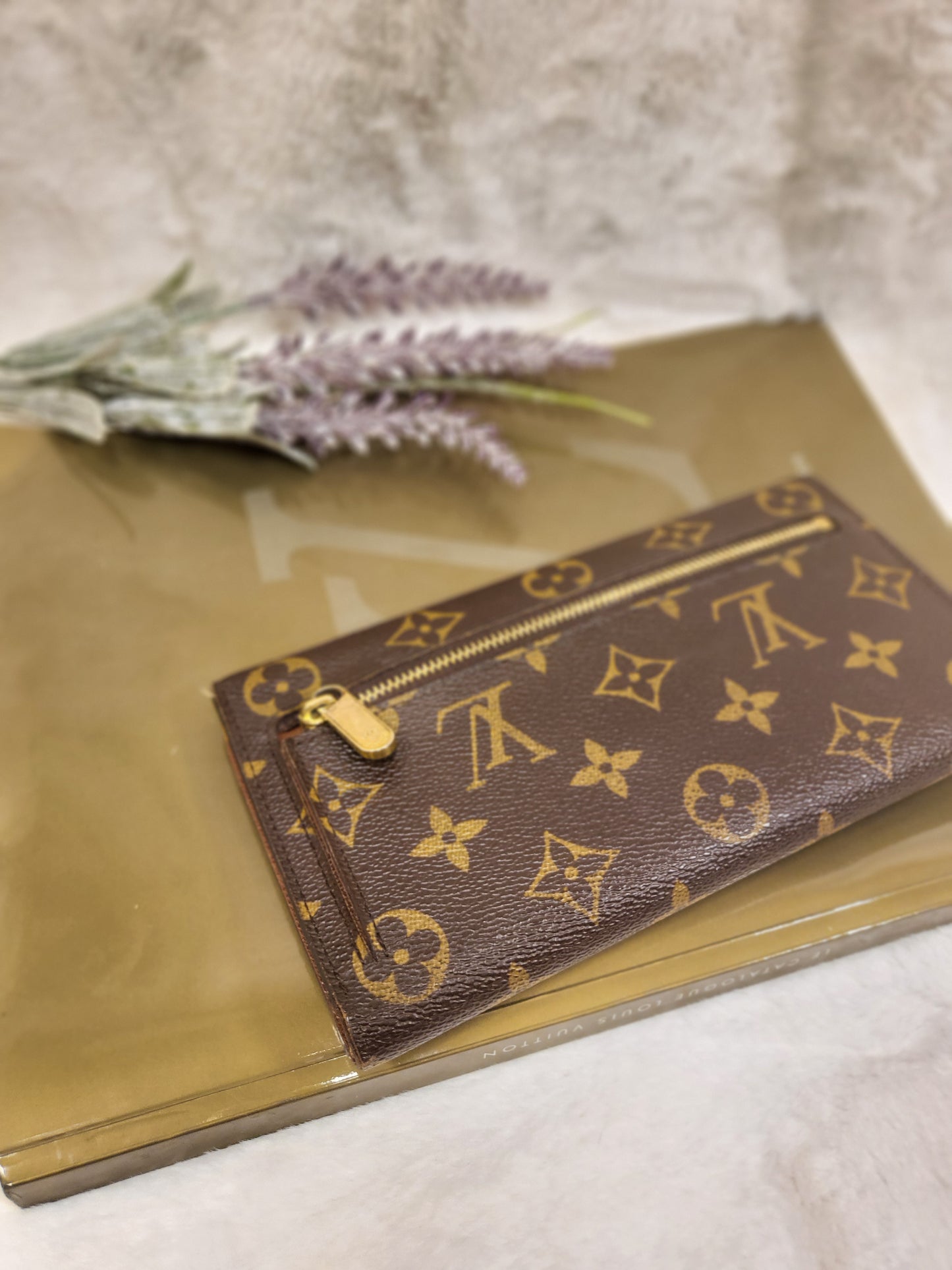 Authentic pre-owned Louis Vuitton Portefeuille Eugenie long wallet