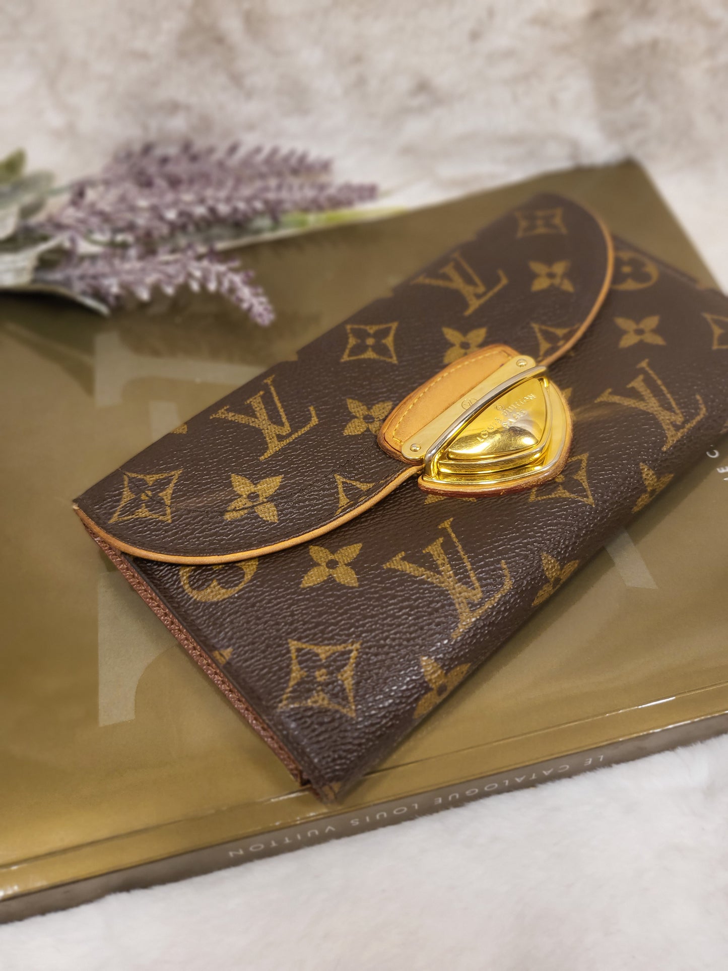Authentic pre-owned Louis Vuitton Portefeuille Eugenie long wallet