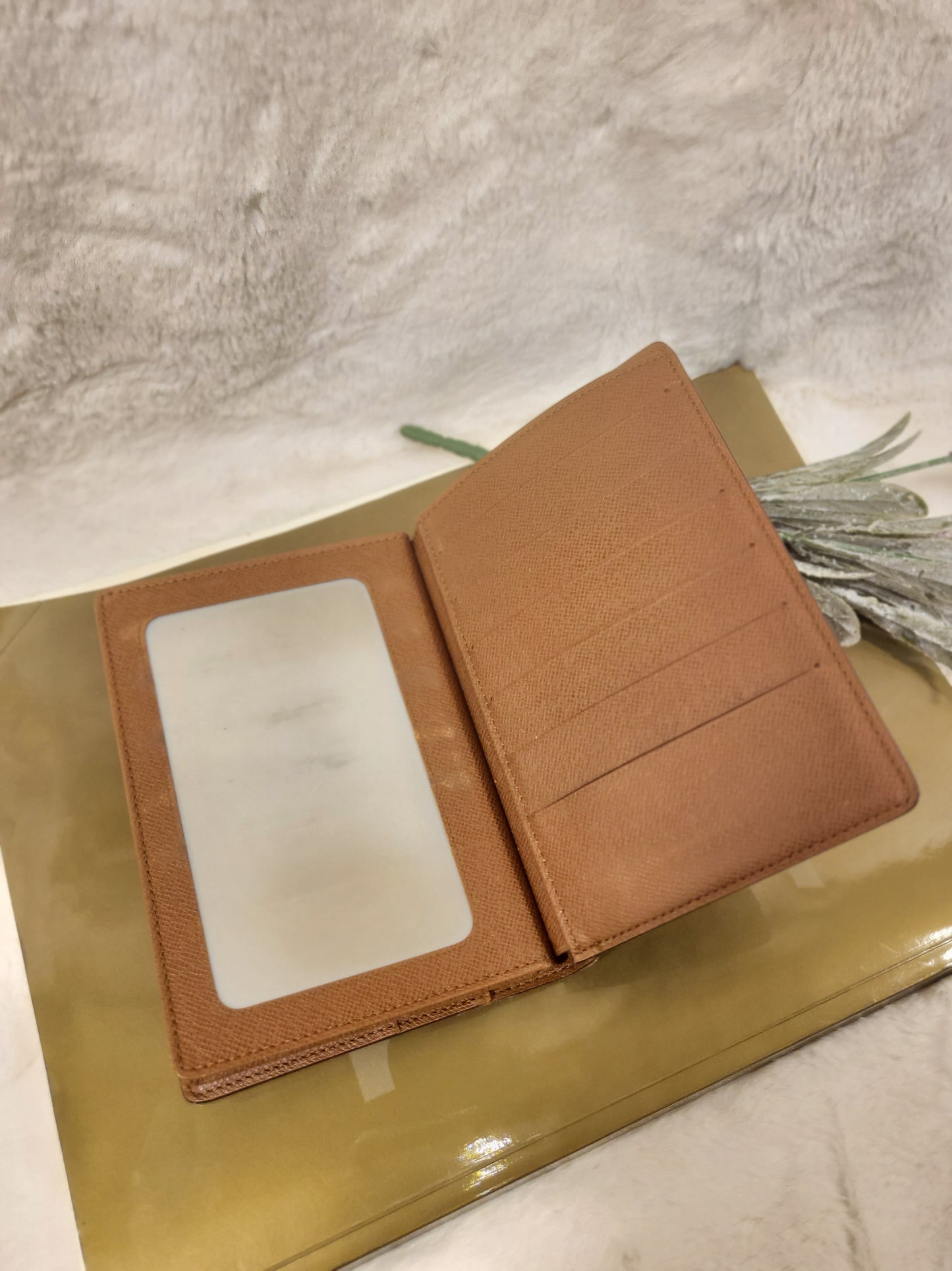 Authentic pre-owned Louis Vuitton passport holder