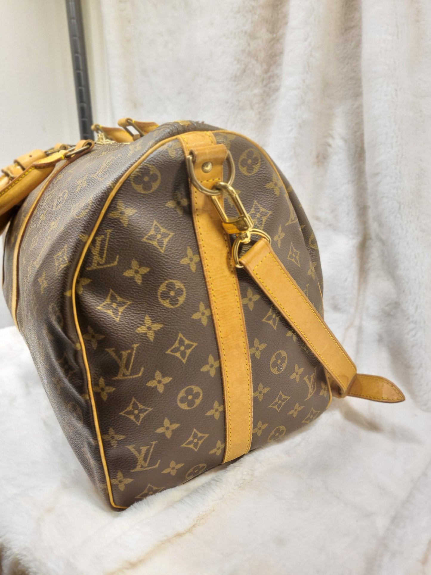 Authentic pre-owned Louis Vuitton Keepall 50 bandoliere travel duffel bag